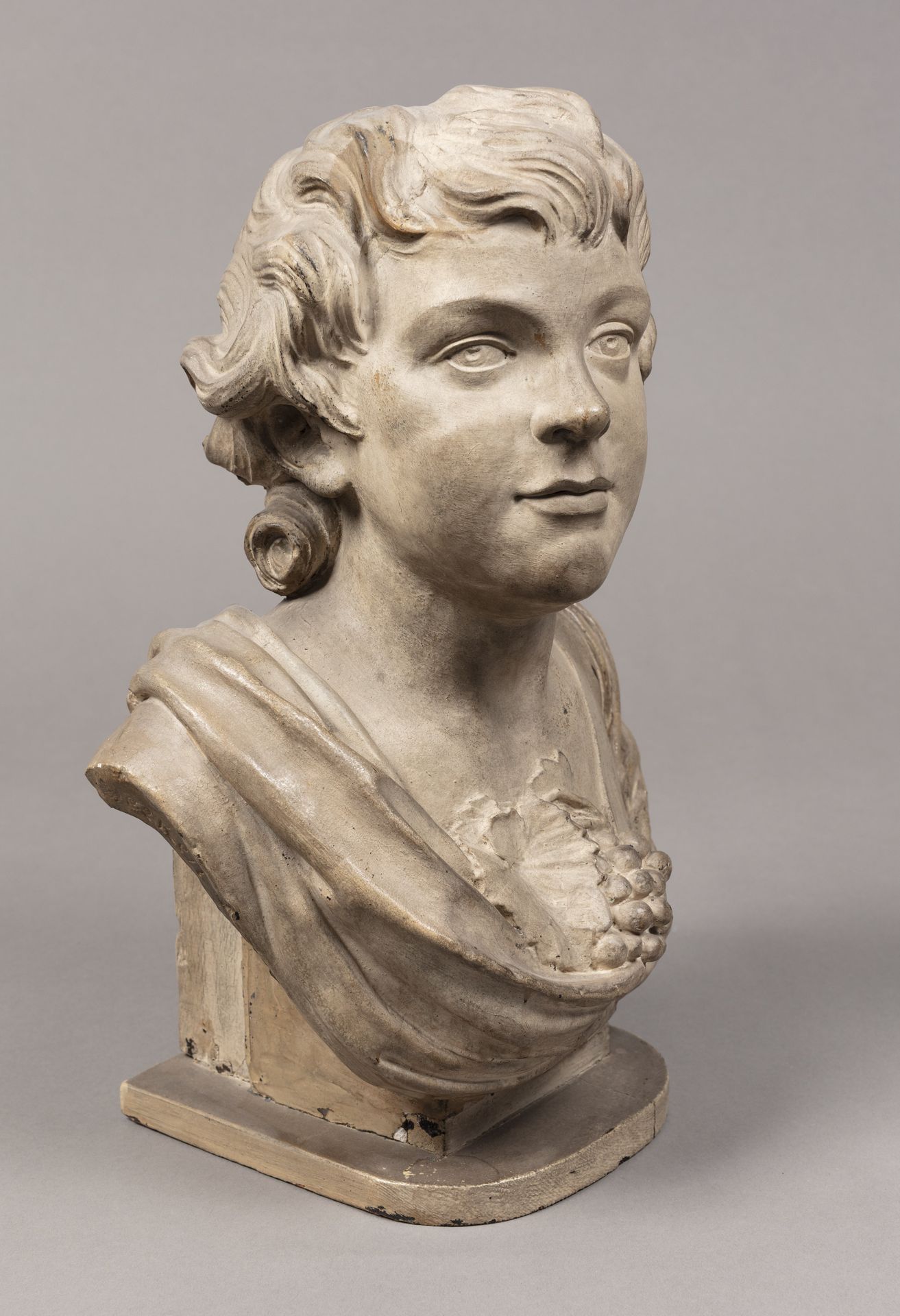 En dreng smykket med druer og vinløv by Hartman Beeken