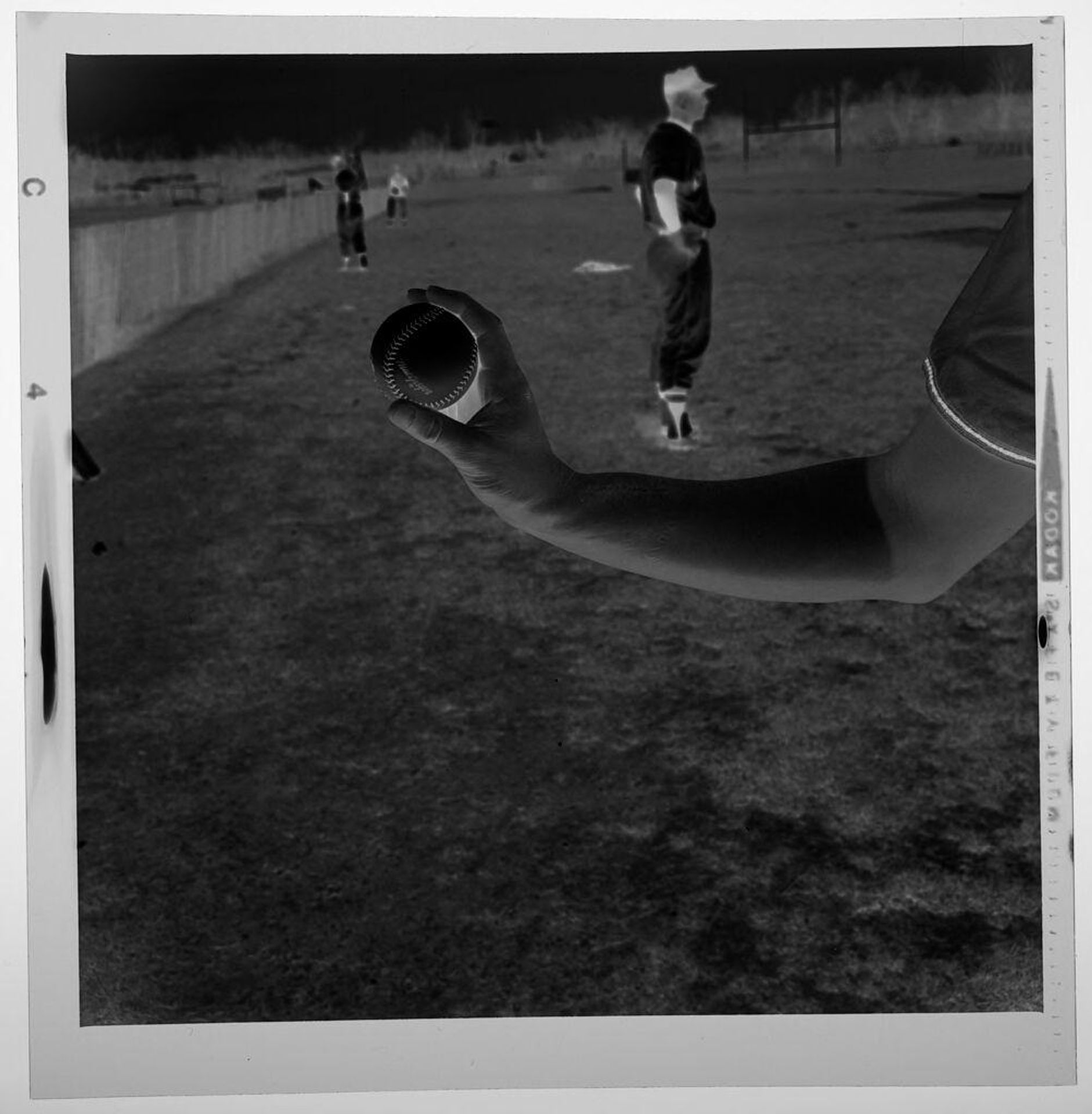 Untitled (hand of baseball player holding baseball) by Jack Gould