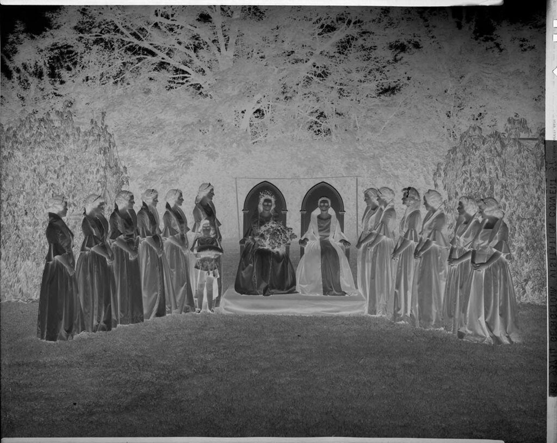 Untitled (formally dressed girls, two on thrones, outside) by Harris & Ewing