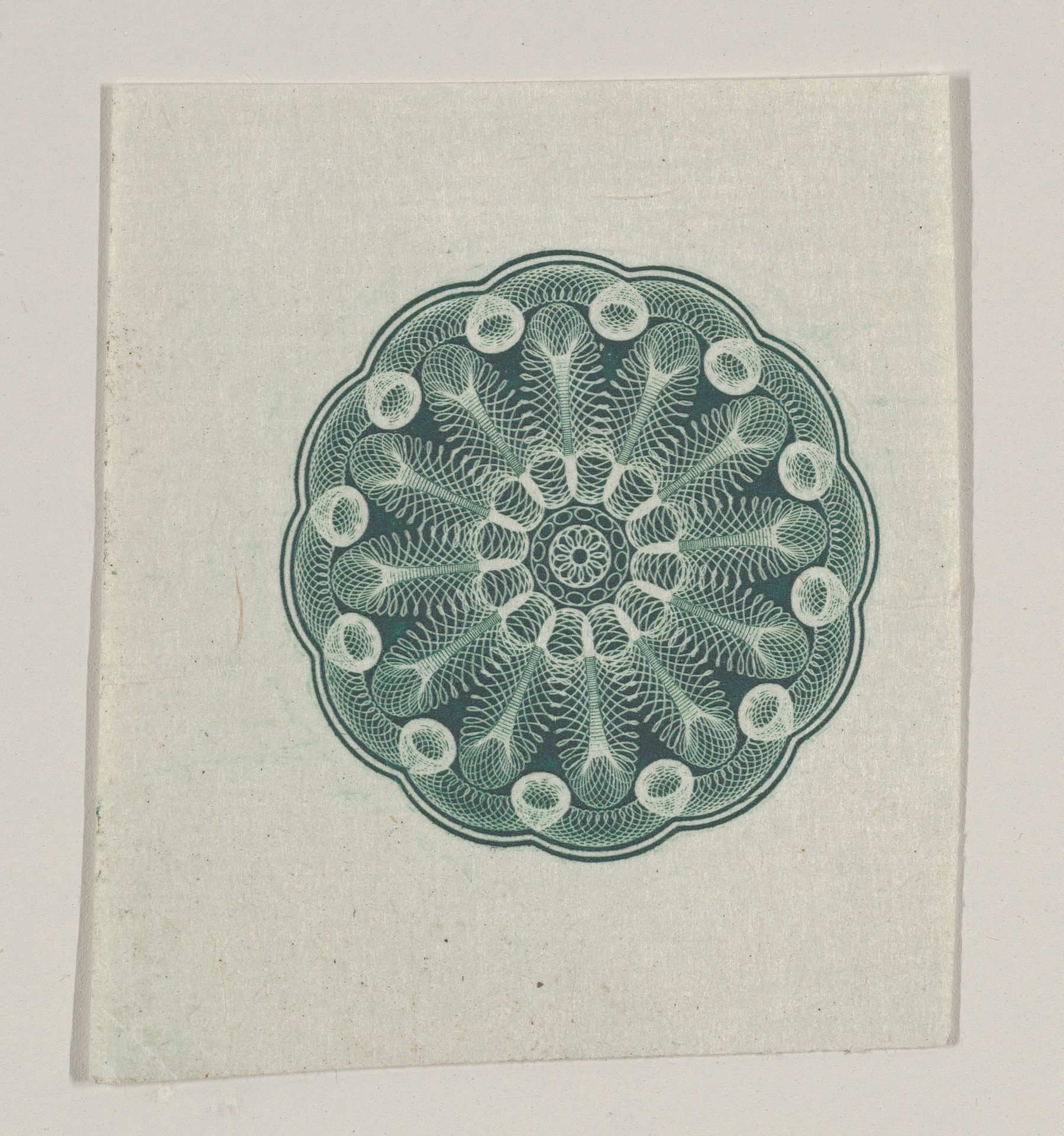 Banknote motif: small circular ornament containing floral lathe work by Cyrus Durand