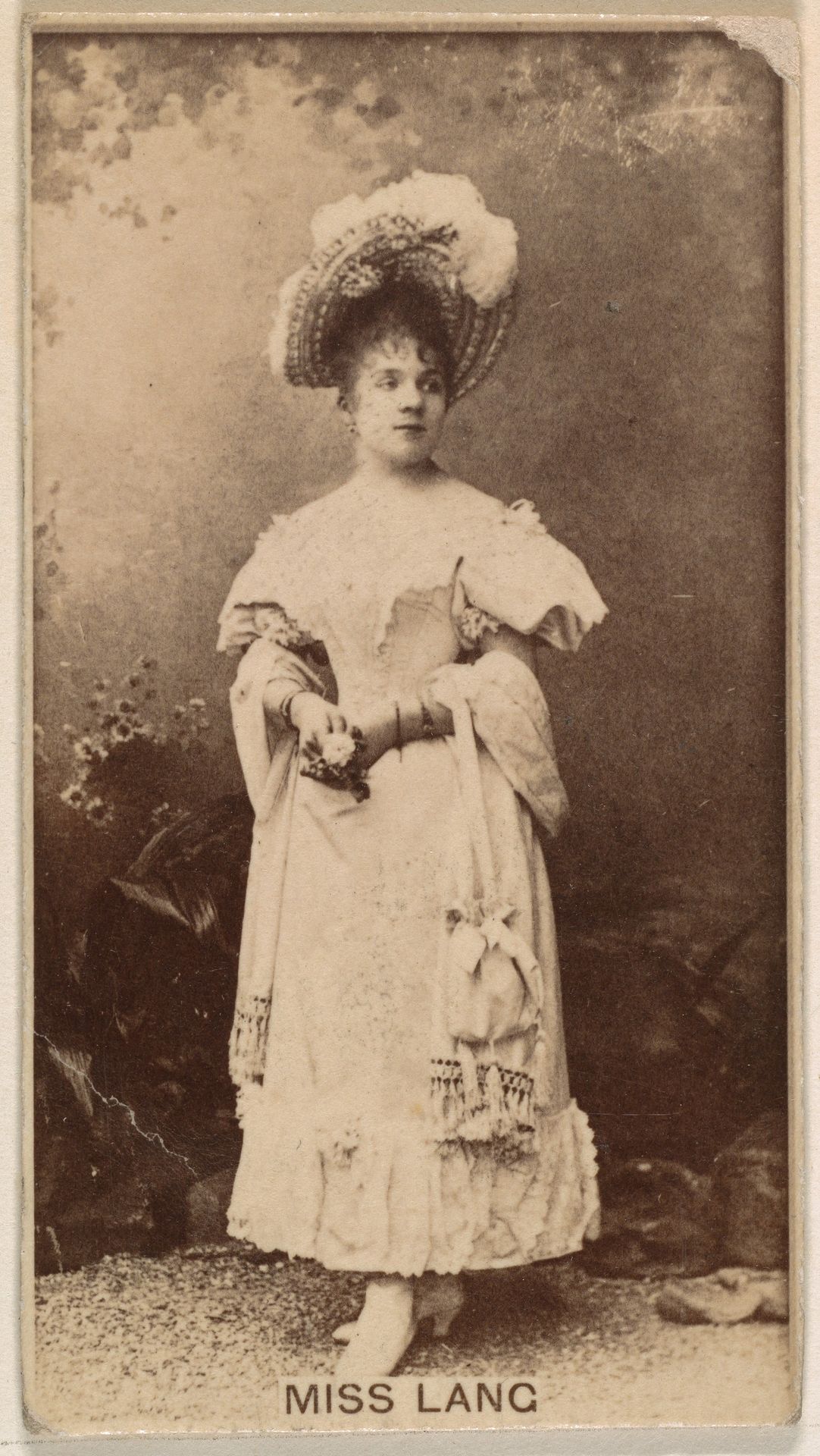 Miss Lang, from the Actresses series (N245) issued by Kinney Brothers to promote Sweet Caporal Cigarettes by Kinney Brothers Tobacco Company
