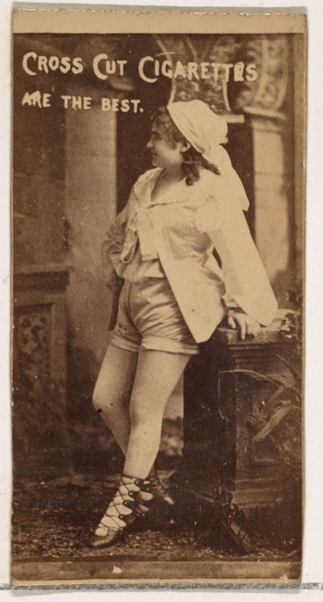 Actress in profile leaning on ornate table, from the Actors and Actresses series (N145-1) issued by Duke Sons & Co. to promote Cross Cut Cigarettes by W. Duke, Sons & Co.