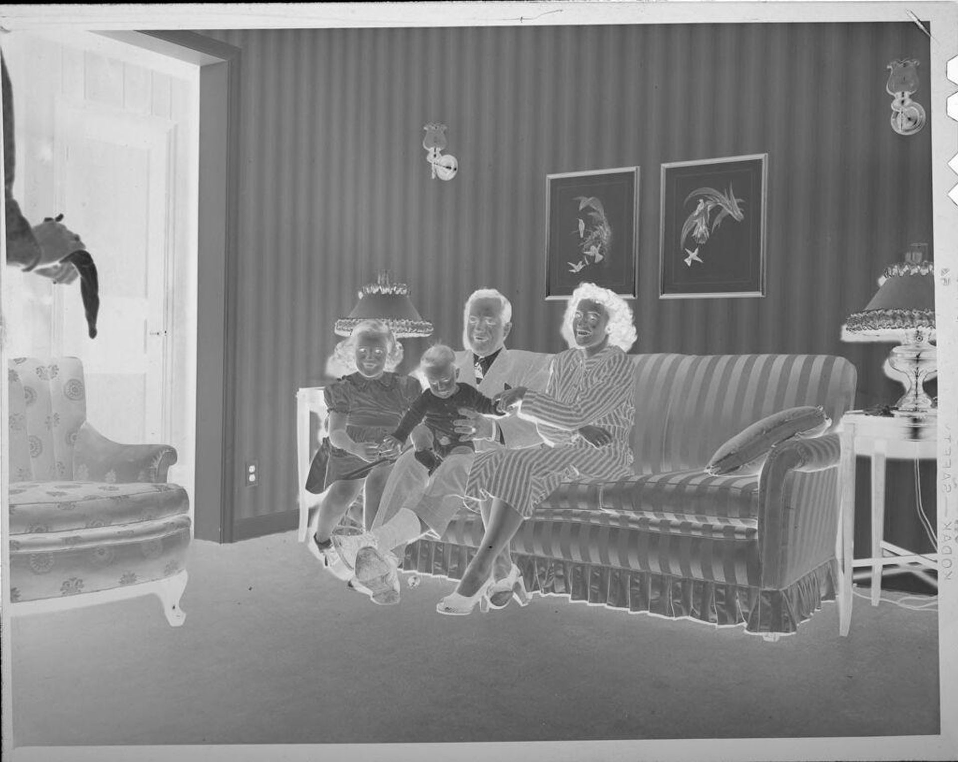 Untitled (family portrait on couch) by Lucian and Mary Brown