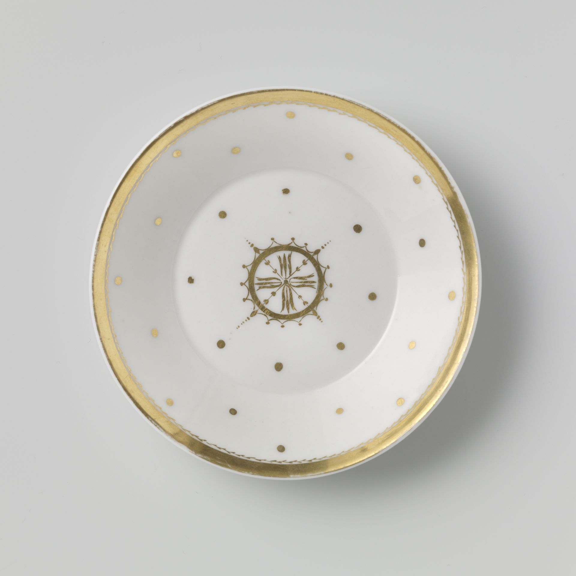 Saucer with a medallion among dots by Anonymous