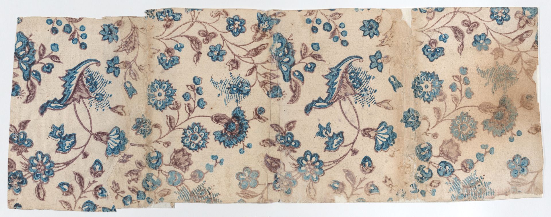 Four adjoined sheets with overall blue and purple floral pattern by Anonymous