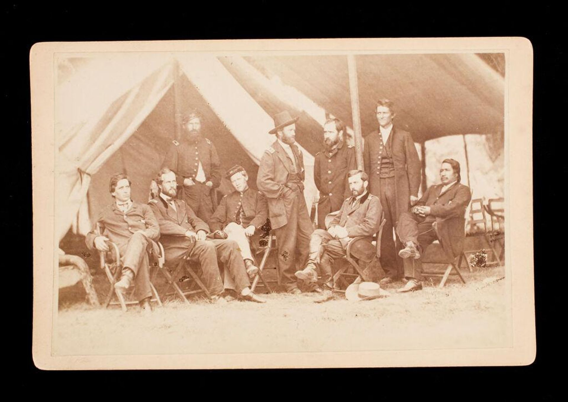 Untitled (General Grant with eight unidentified men in front of tent) by Mathew B. Brady