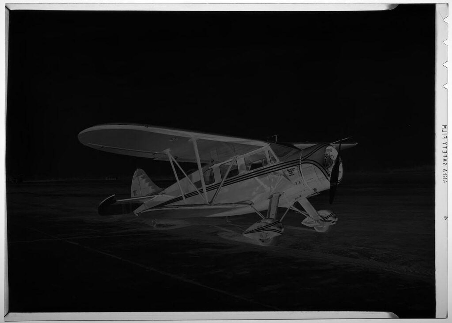 Untitled (small airplane on Robertson, MO airstrip) by Martin Schweig