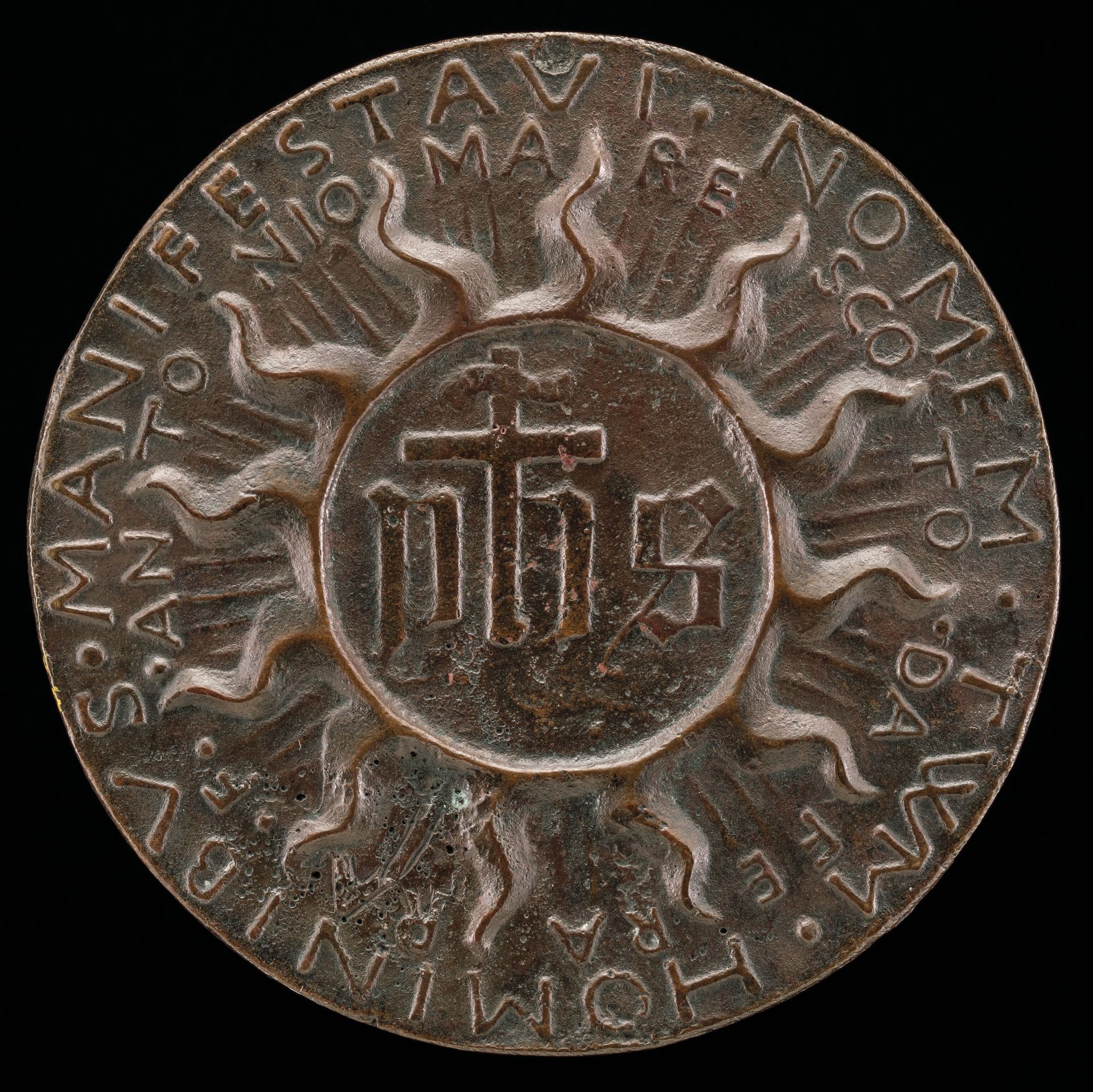 The Trigram IHS in a Flaming Halo [reverse] by Antonio Marescotti