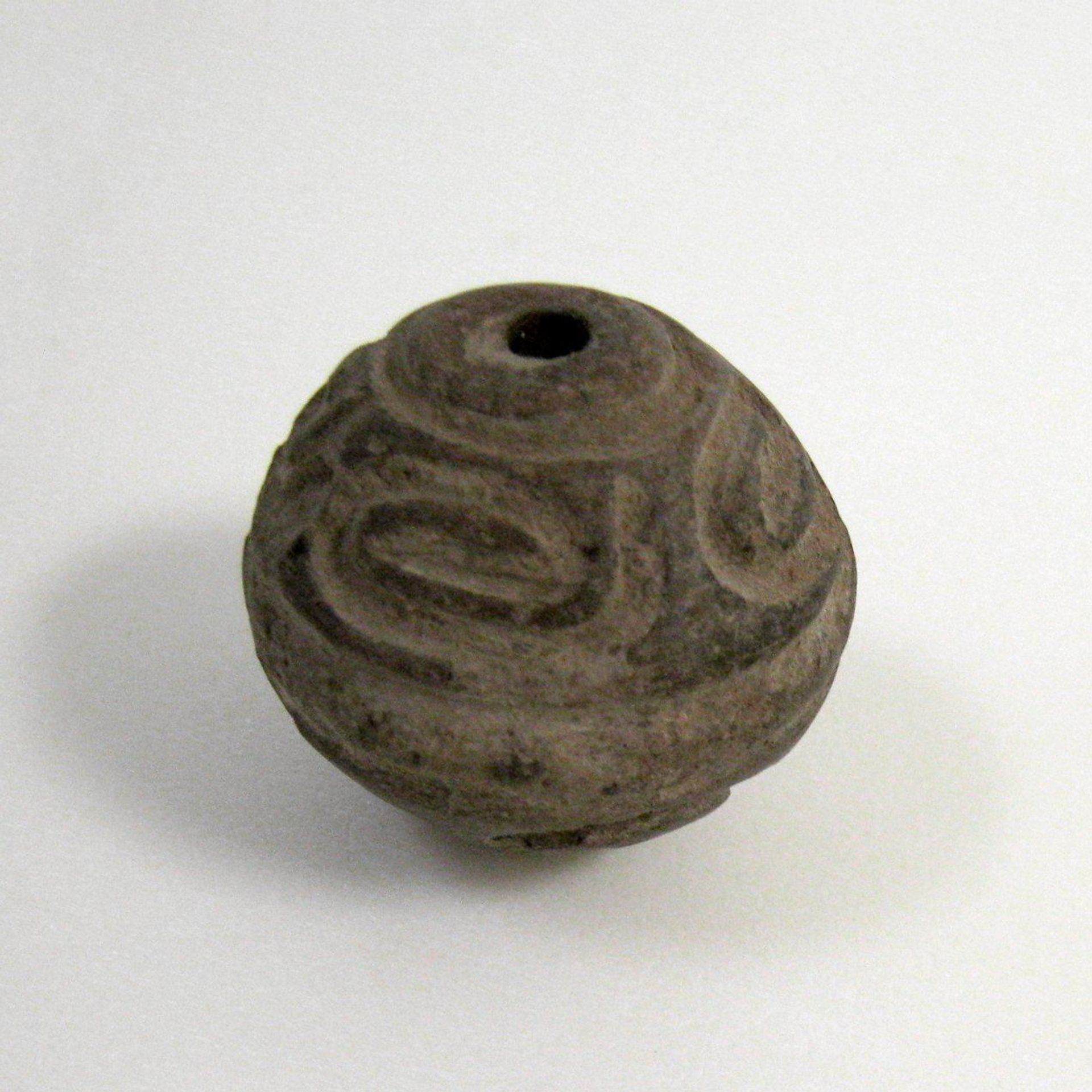 Spindle Whorl by Anonymous