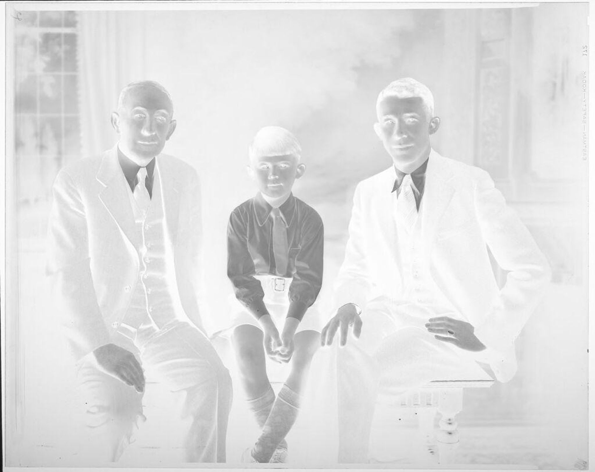 Untitled (portrait of three men, three generations) by Hamblin Studio