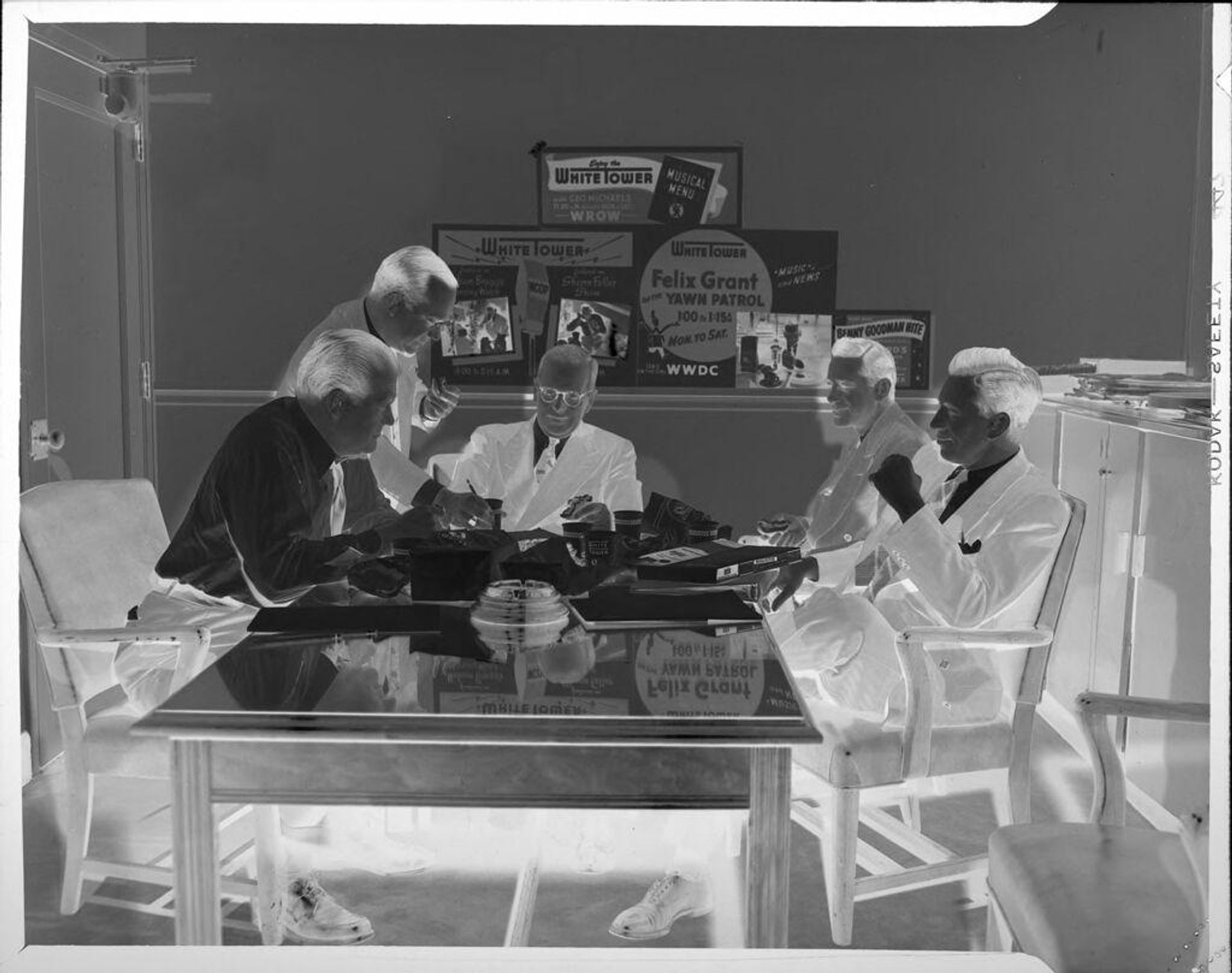 Untitled (advertising executives on "White Tower" account) by Peter James Studio