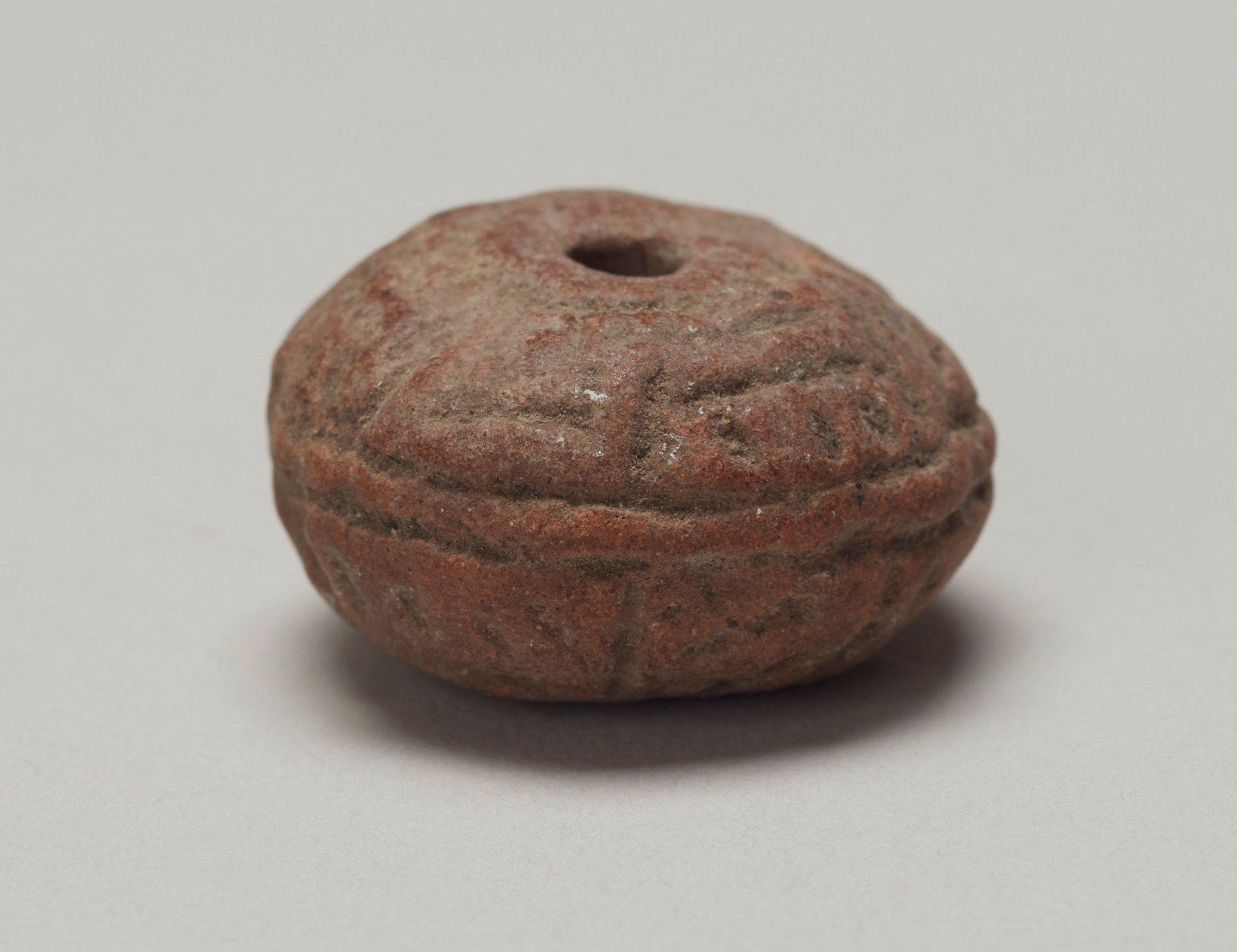 Spindle Whorl by Anonymous