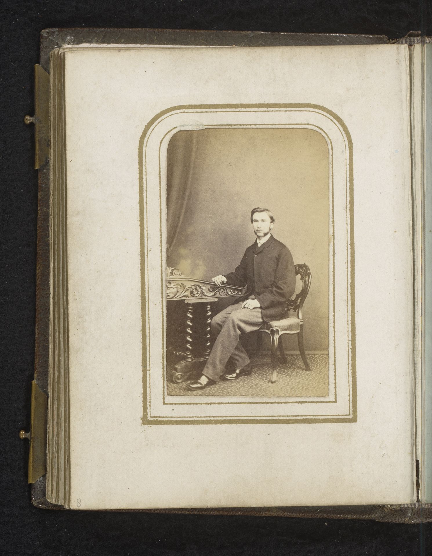 Portret van een man, zittend aan een tafel by John Ross