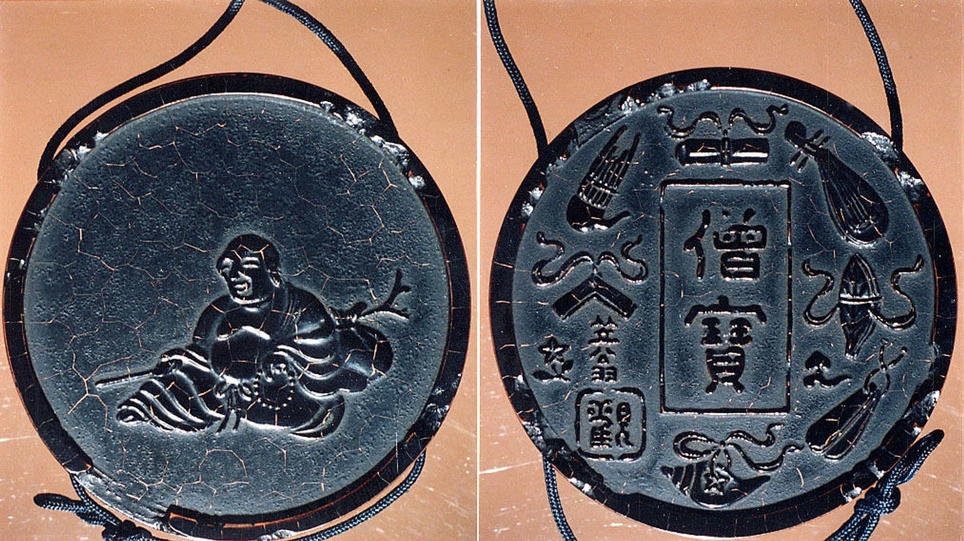Case (Inrō) in the Shape of an Ink Stick with Design of Hotei (Putai) (obverse); Musical Instruments (reverse) by Shibata Zeshin