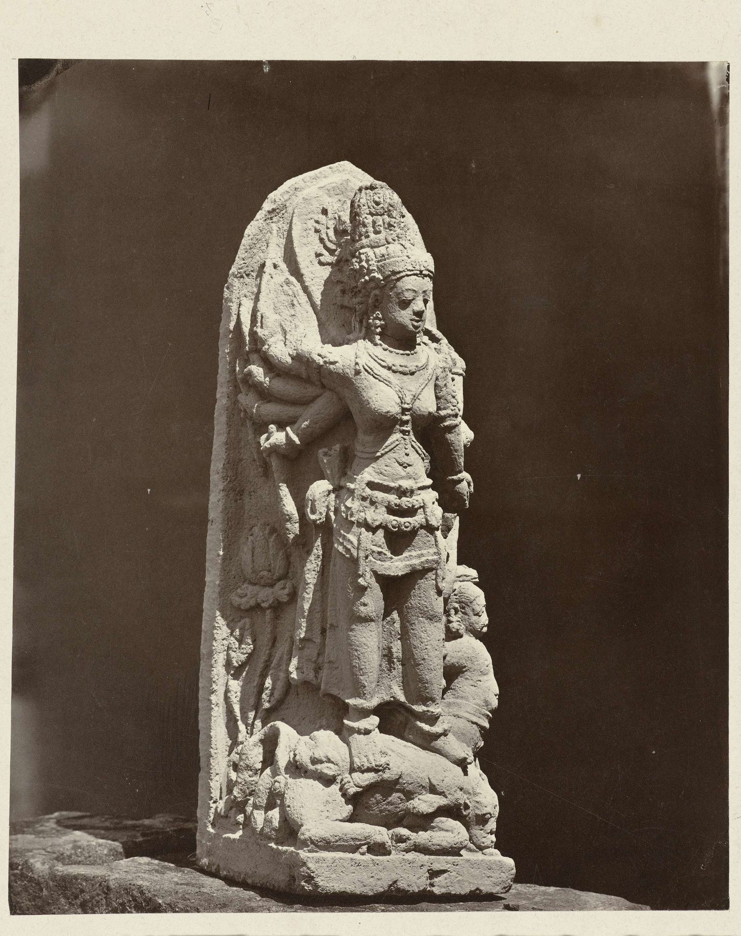 Ten armed Durga slaying the demon Mahisha, upper right arm missing. Dieng Plateau, Wonosobo district, Central Java province, 9th century. by Isidore Kinsbergen