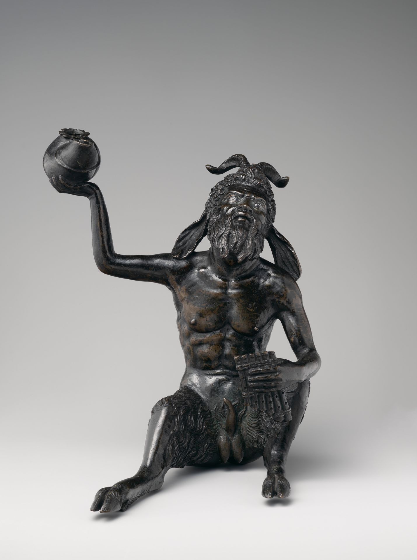 Seated satyr with silvered eyes by Andrea Briosco, called Riccio