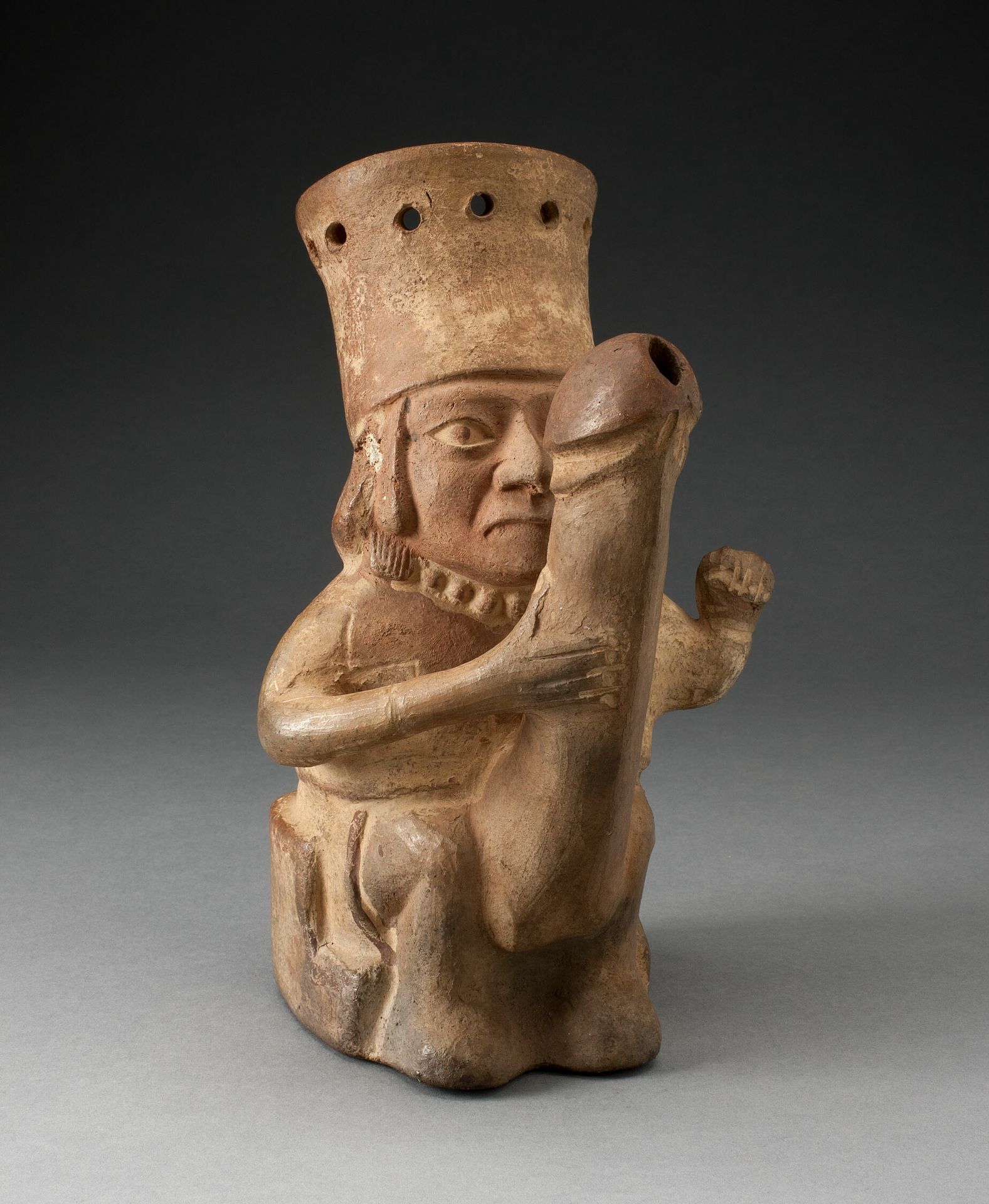 Rhyton in the Form of a Man with an Exaggerated Phallus by Moche