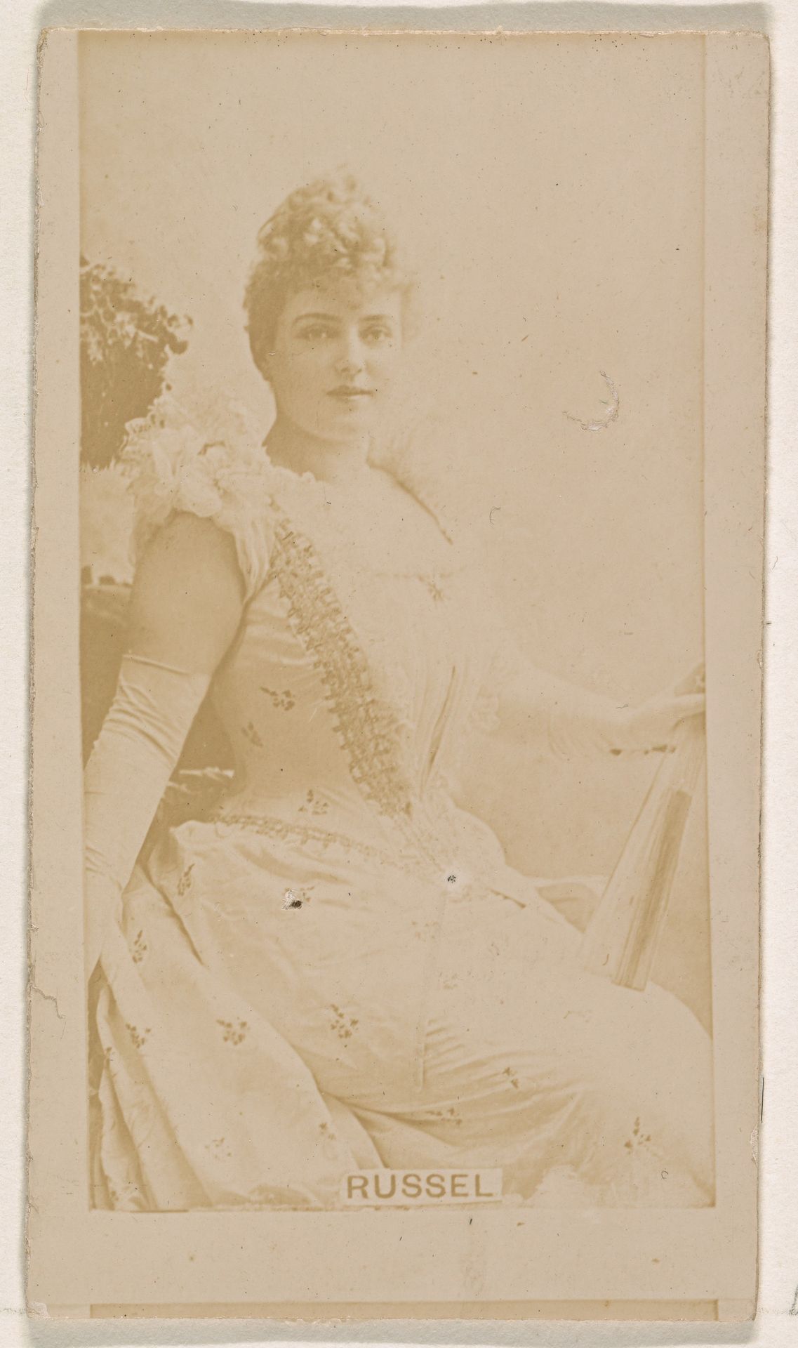 Russell, from the Actresses series (N245) issued by Kinney Brothers to promote Sweet Caporal Cigarettes by Kinney Brothers Tobacco Company