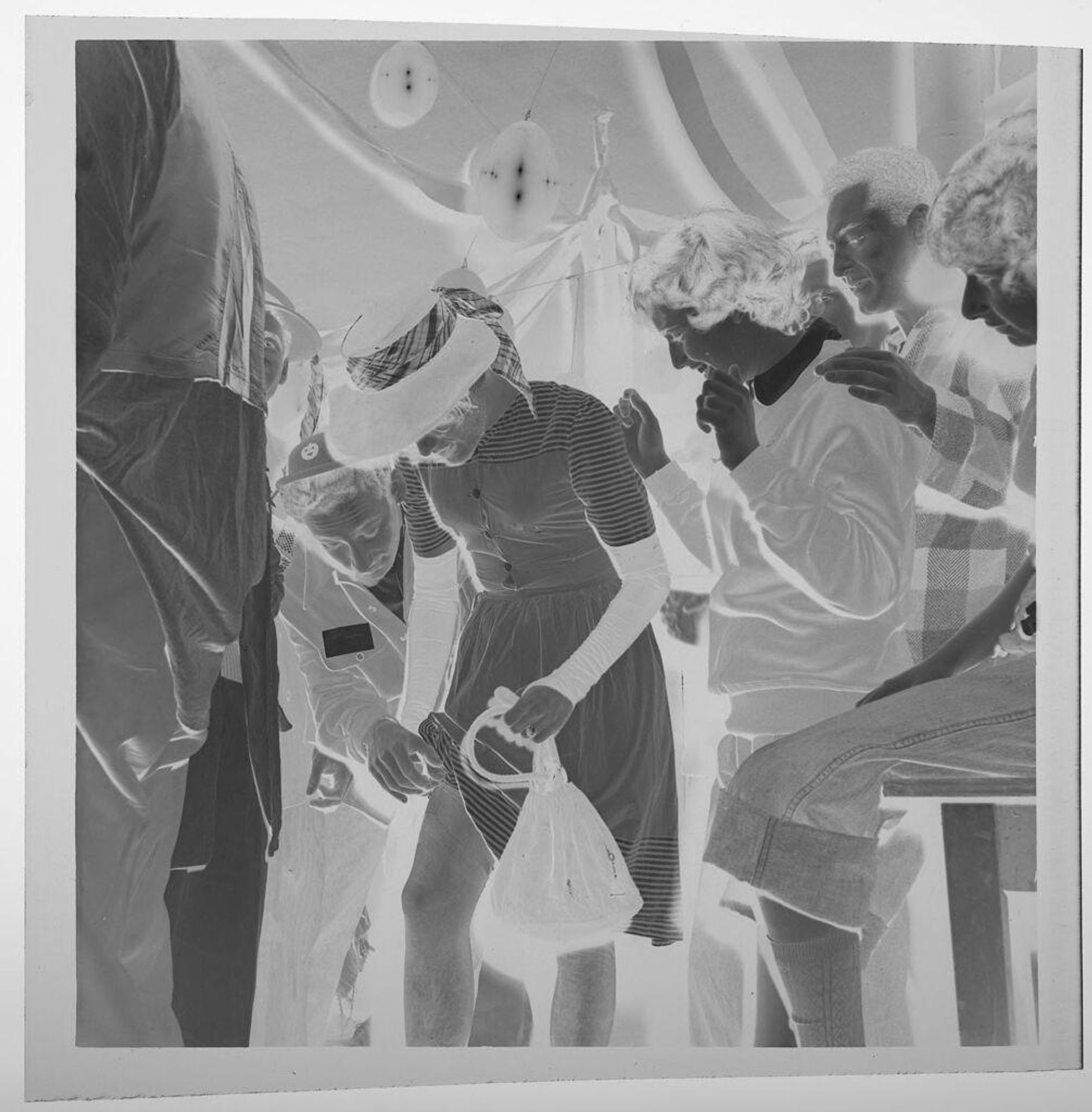 Untitled (fraternity dance, man looking at woman's stocking) by Jack Gould
