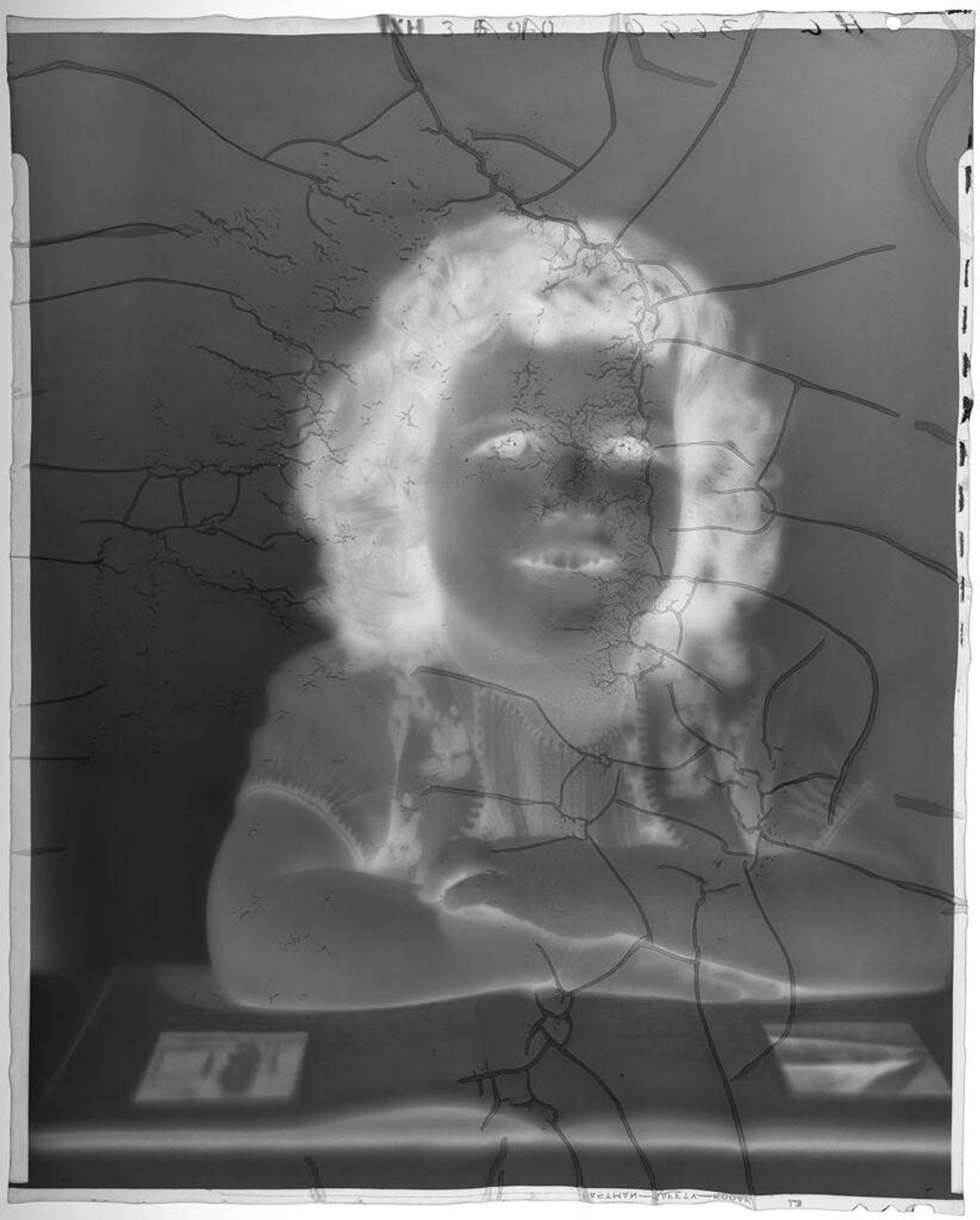 Untitled (portrait of little girl leaning forward on table) by Paul Gittings