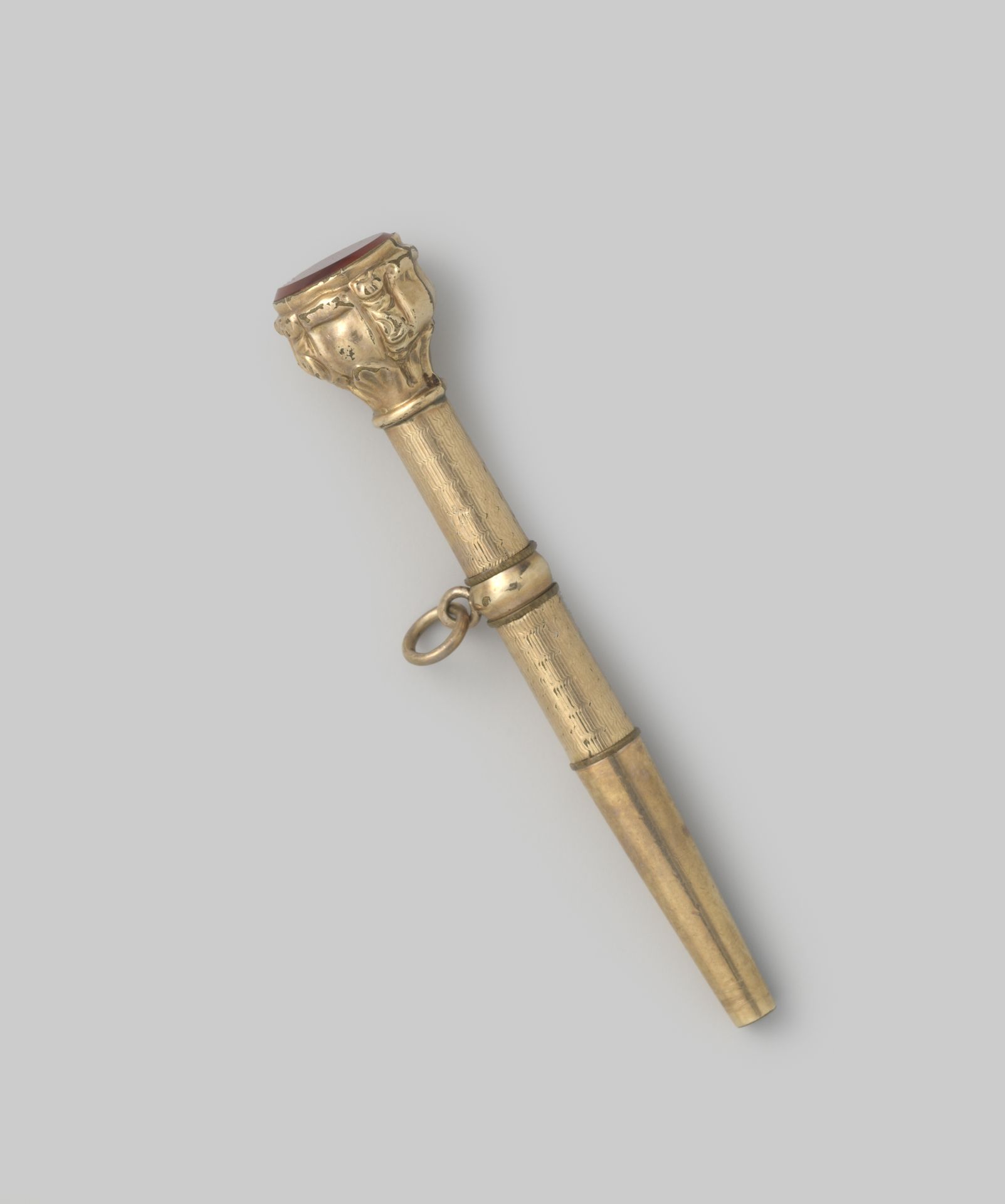 Sleutel van gouden herenhorloge by Gaudy