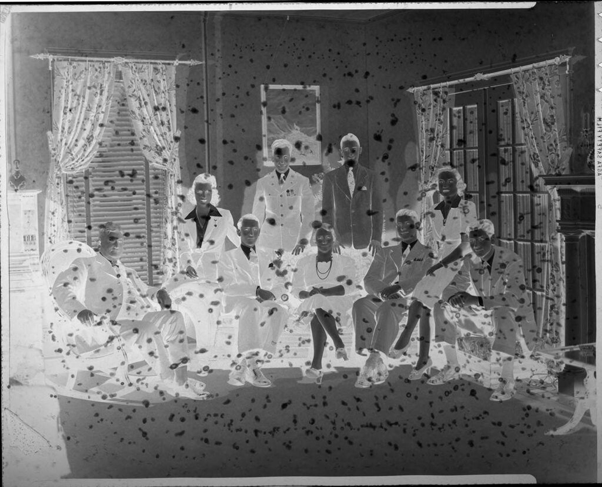 Untitled (family portrait in living room) by Hamblin Studio