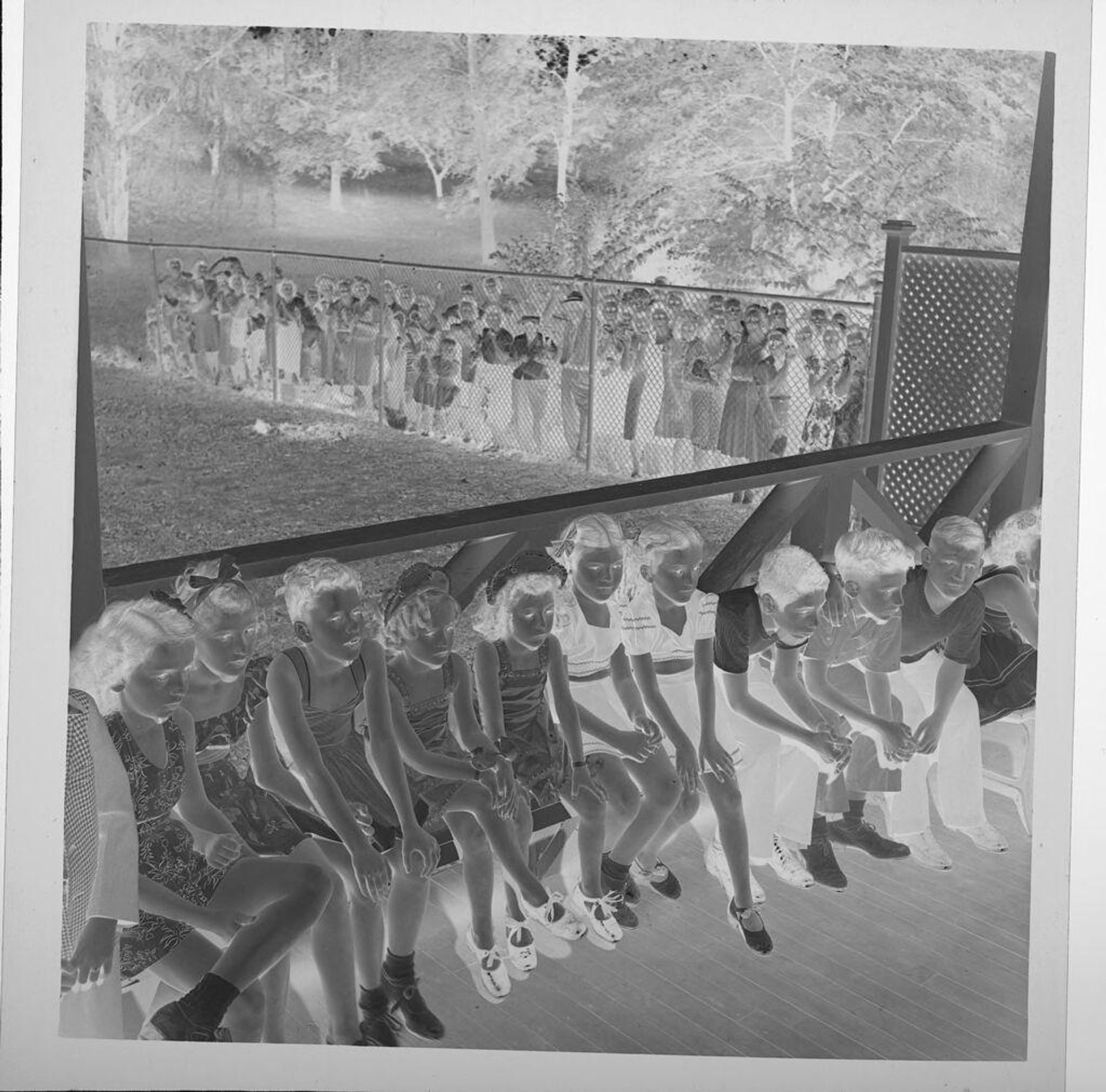 Untitled (children in costumes auditioning for theater, sitting in long line ) by Jack Gould