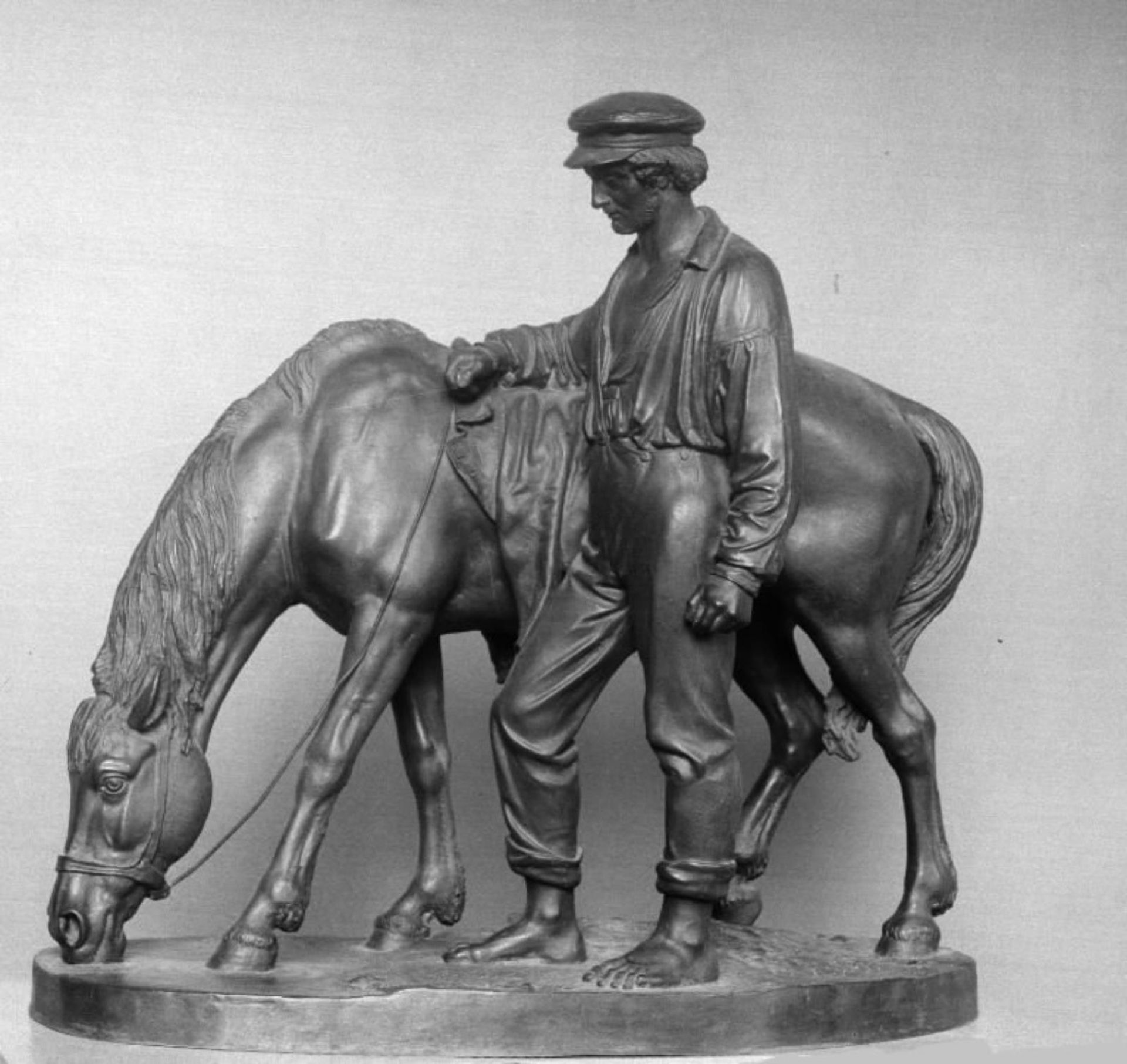 En karl, der vander en hest by O. Evens