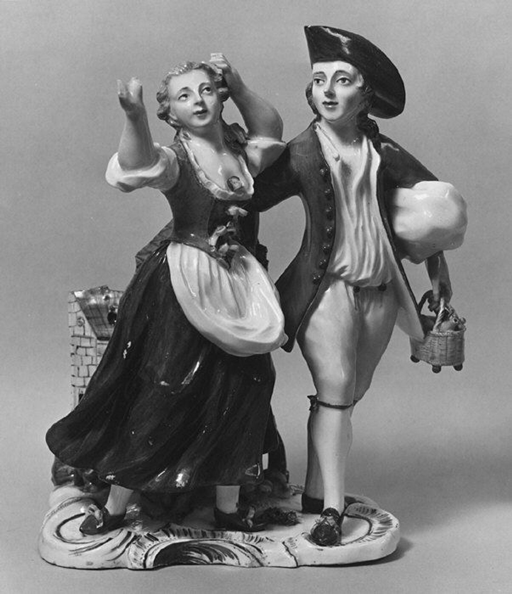 Boy and girl fleeing from a burning building by Höchst Manufactory