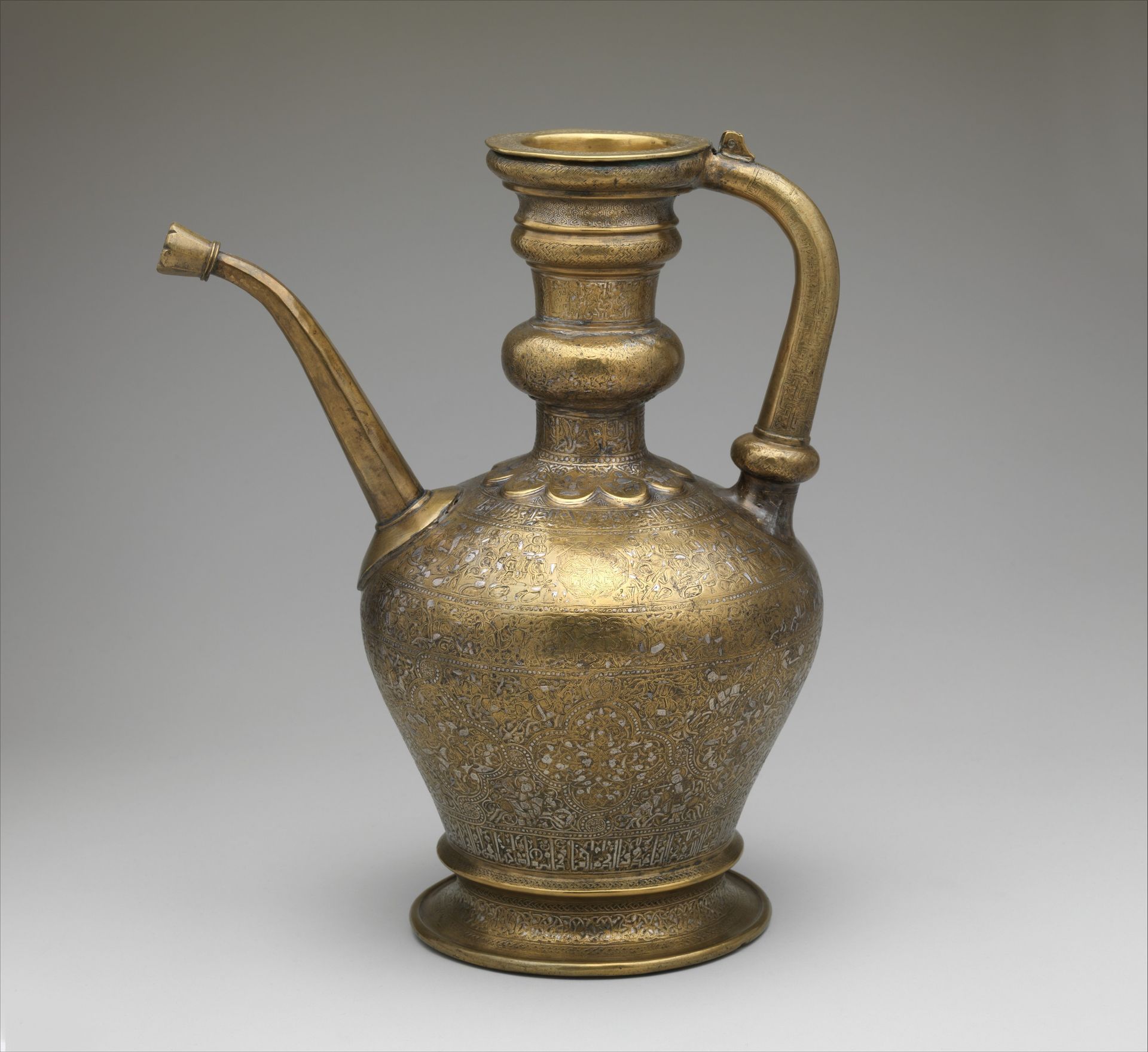 Ewer with Inscription, Horsemen, and Vegetal Decoration by `Umar ibn al-Hajji Jaldak
