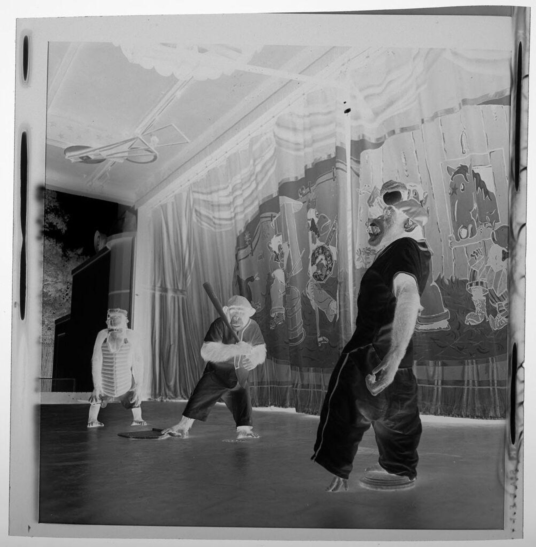 Untitled (chimps playing baseball on a stage) by Jack Gould