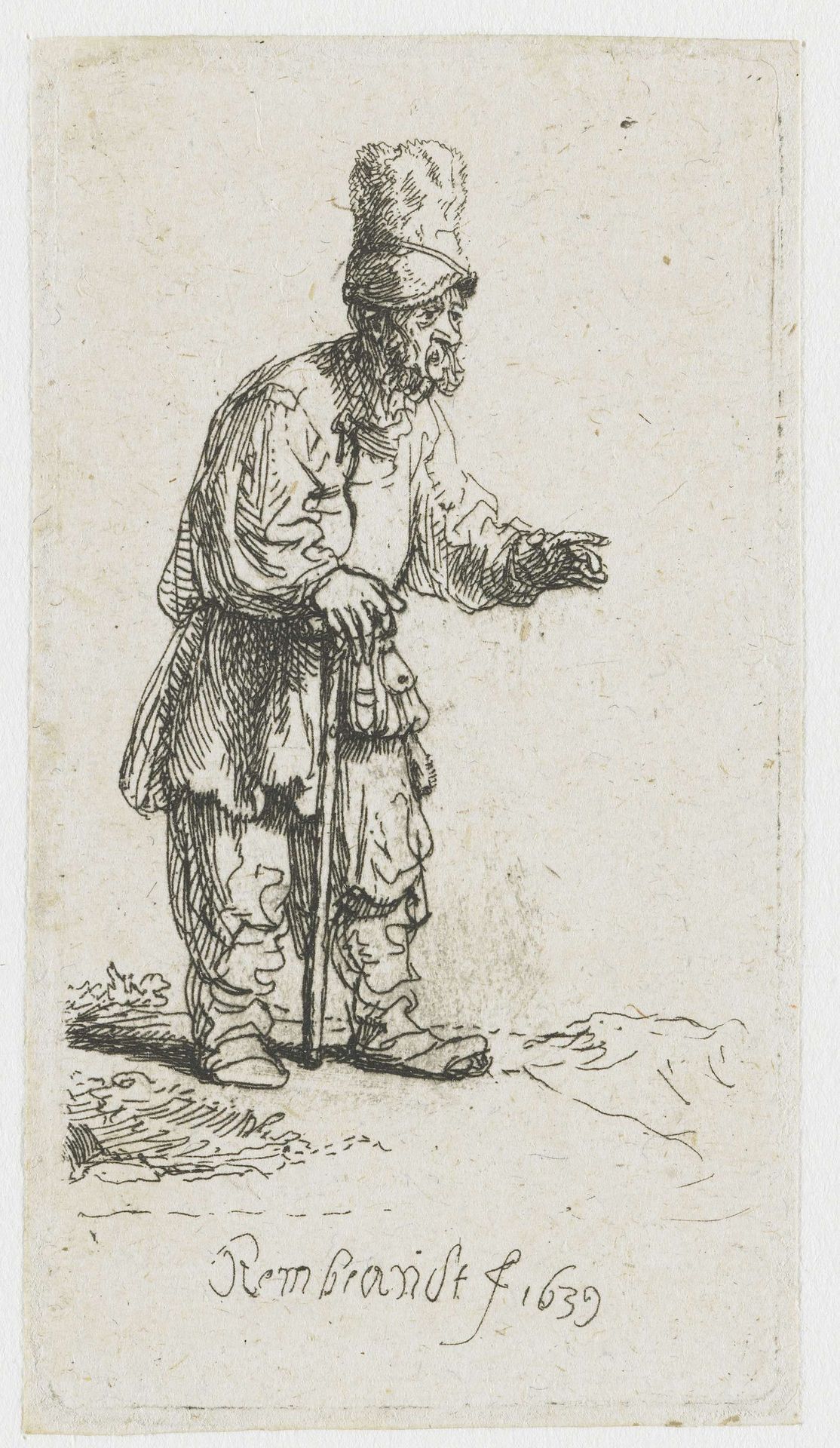 A peasant in a high cap, standing leaning on a stick by Rembrandt van Rijn