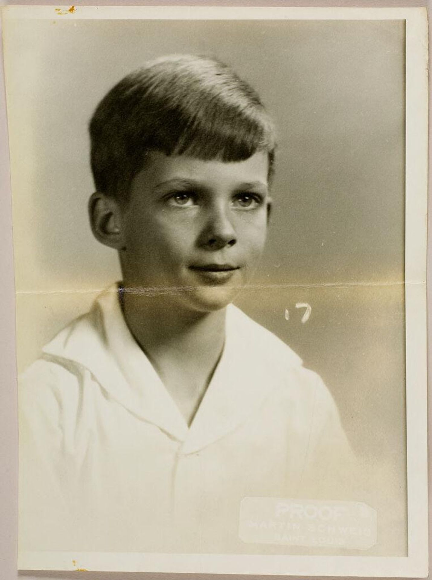 Untitled (double studio portrait of boy wearing shirt with large white collar) by Martin Schweig