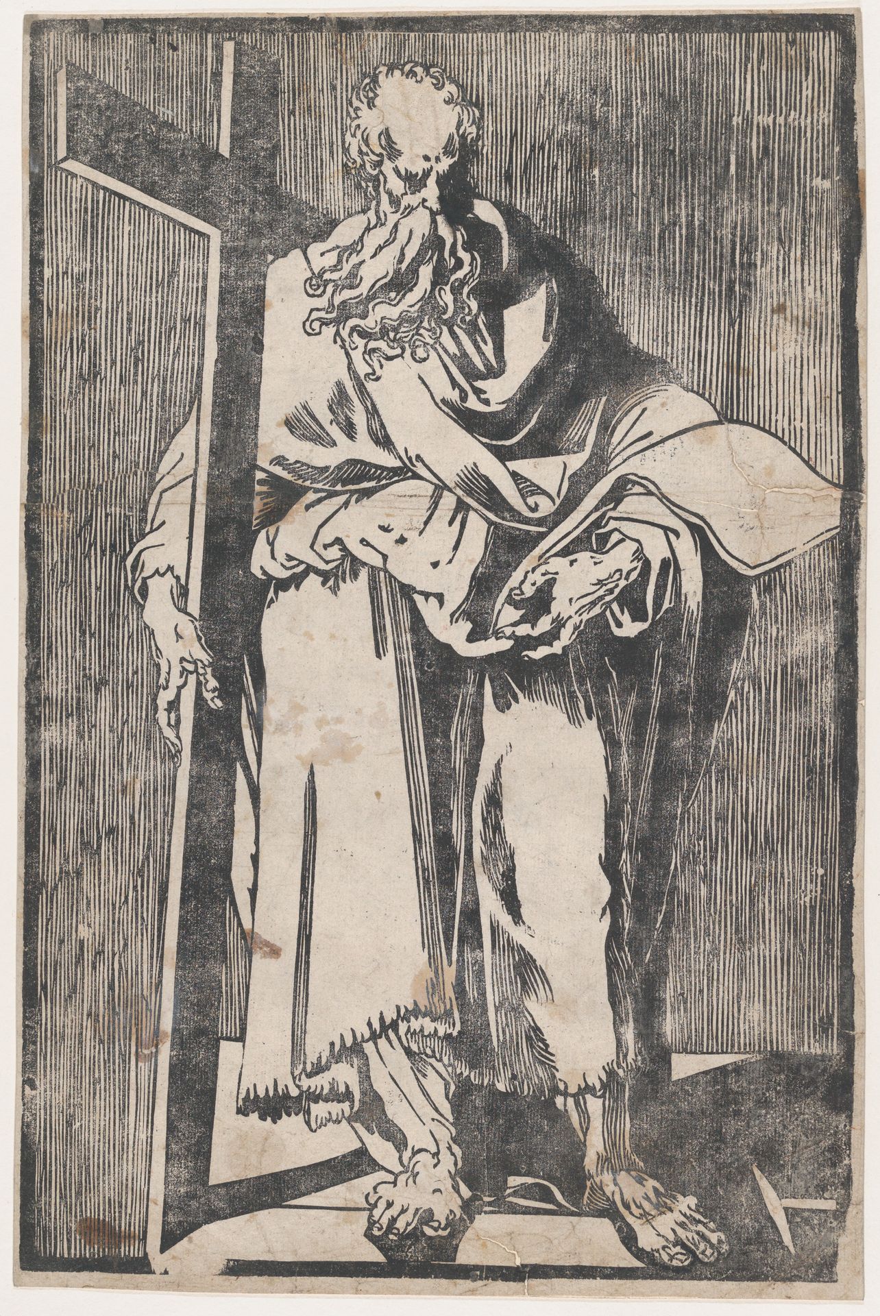 Saint Philip standing holding a book and a cross by Giuseppe Scolari