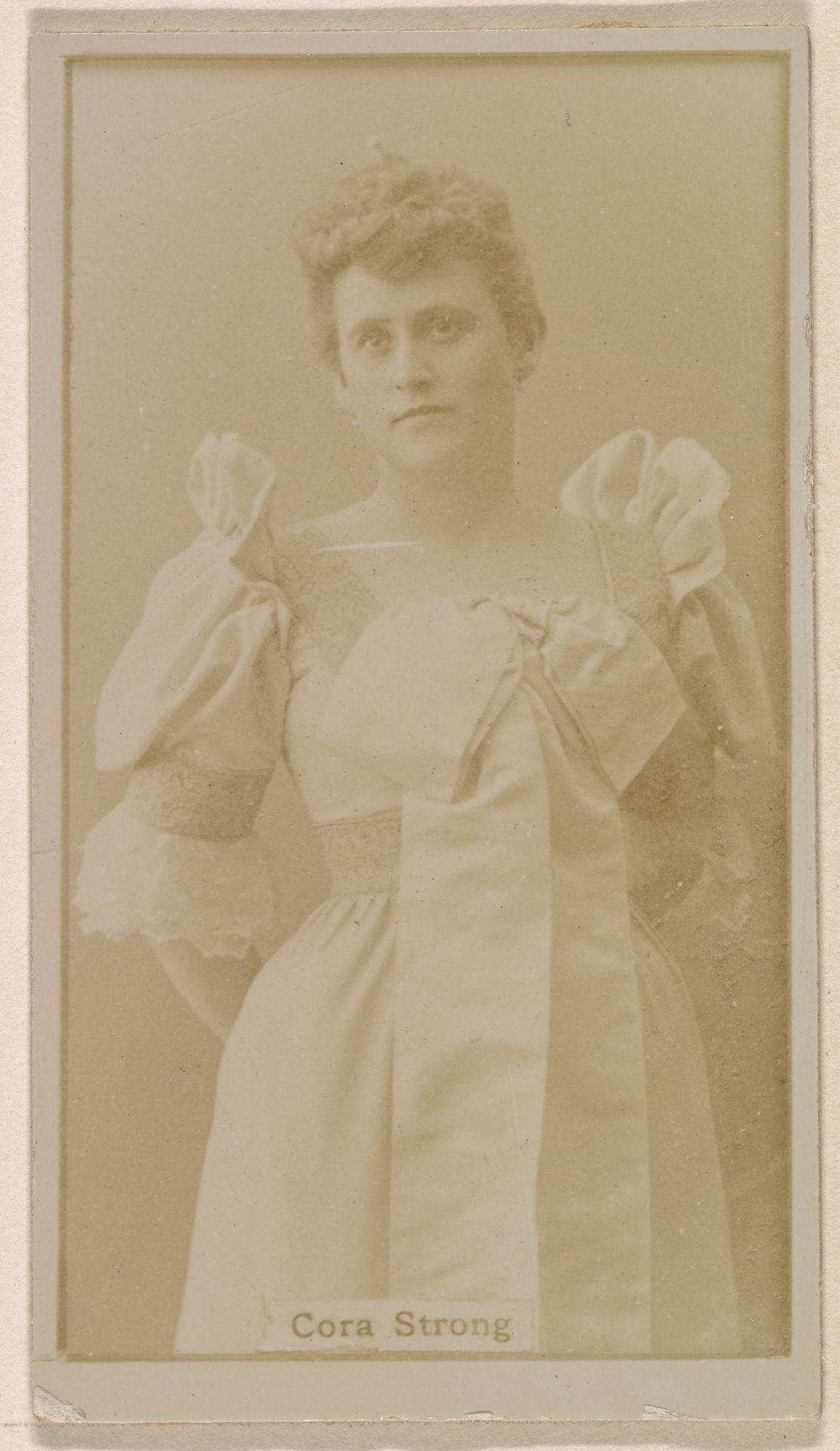 Cora Strong, from the Actresses series (N245) issued by Kinney Brothers to promote Sweet Caporal Cigarettes by Kinney Brothers Tobacco Company