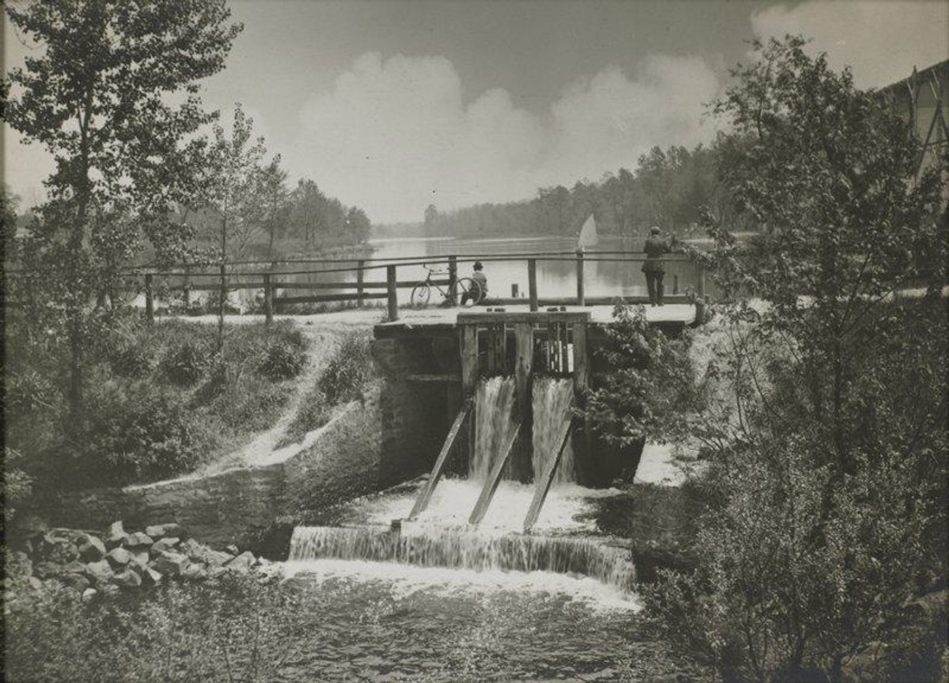Untitled [bridge with bike] by James Bartlett Rich