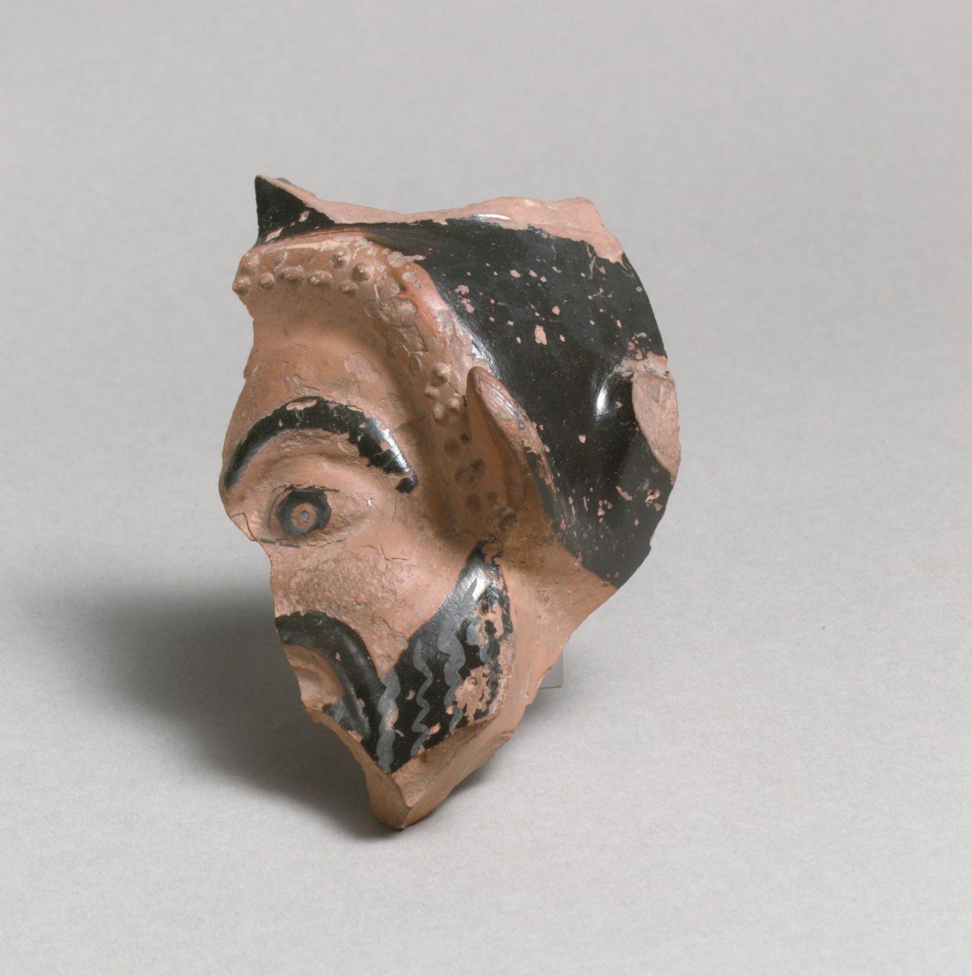 Vase fragment in the form of a satyr's head by Class O: The Sabouroff Class of Head Vases
