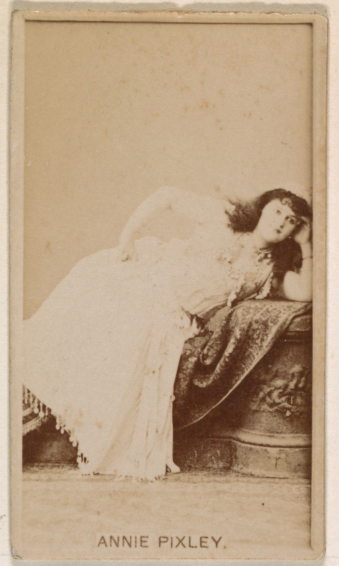 Annie Pixley, from the Actresses series (N245) issued by Kinney Brothers to promote Sweet Caporal Cigarettes by Kinney Brothers Tobacco Company