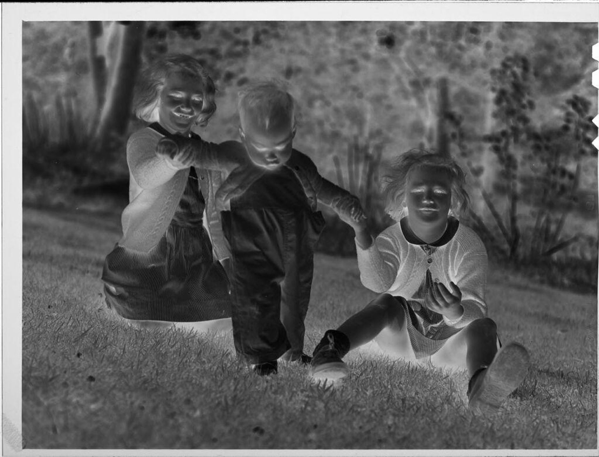 Untitled (two girls and baby outside) by Lucian and Mary Brown
