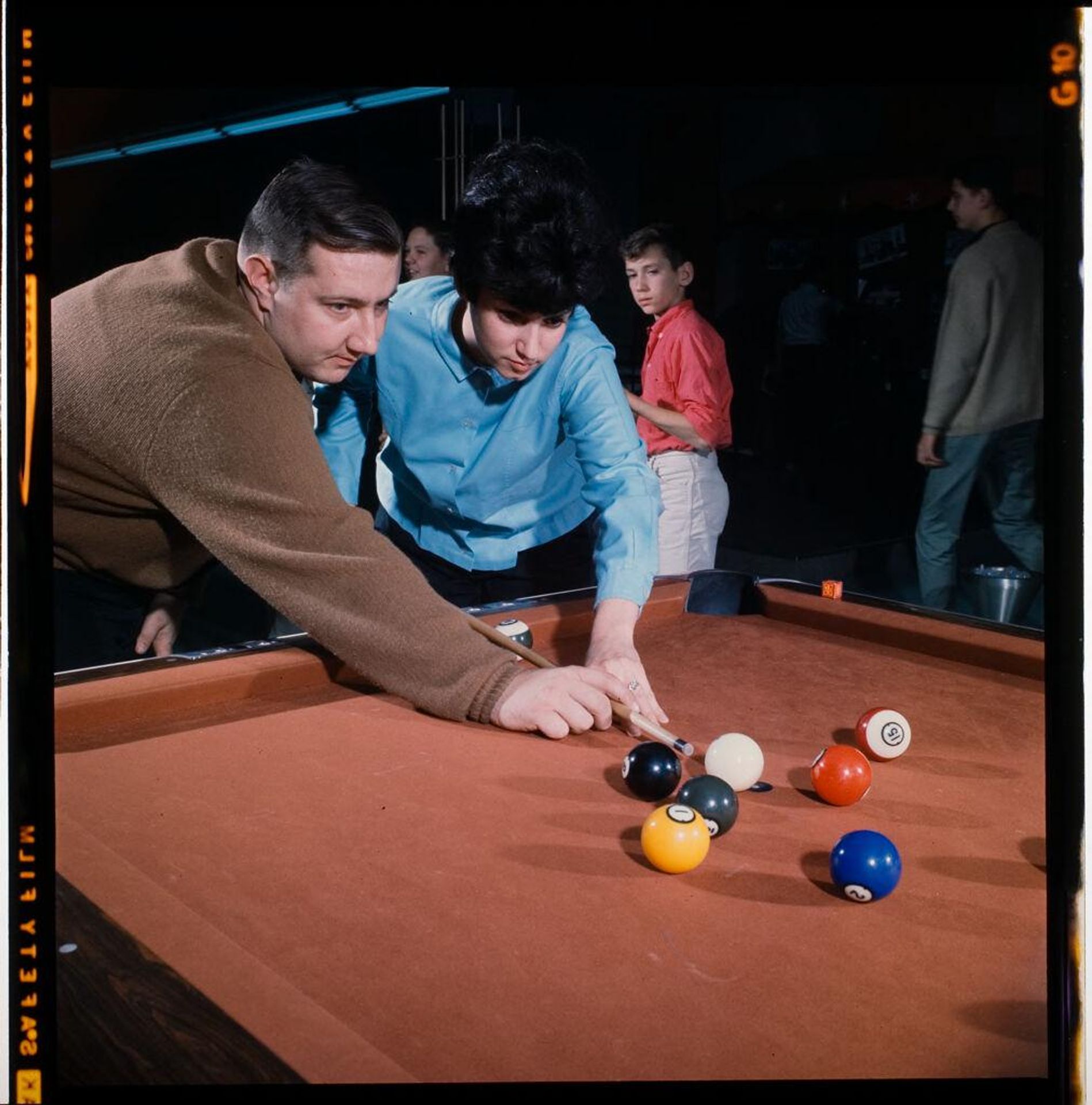 Untitled (woman and man playing pool) by Jack Gould