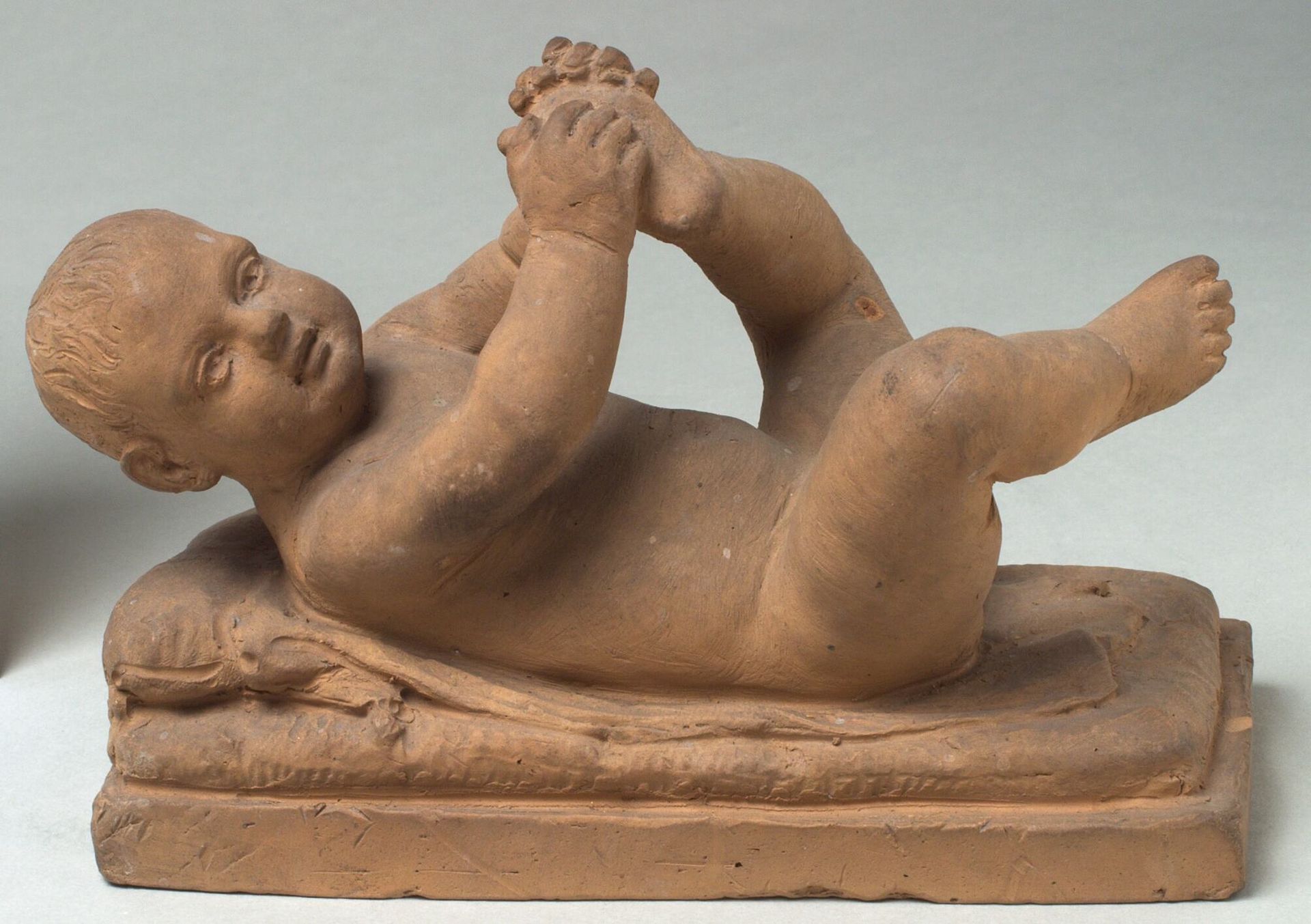 Naked Child Lying on His Back, Playing with His Foot by Georg Christian Freund