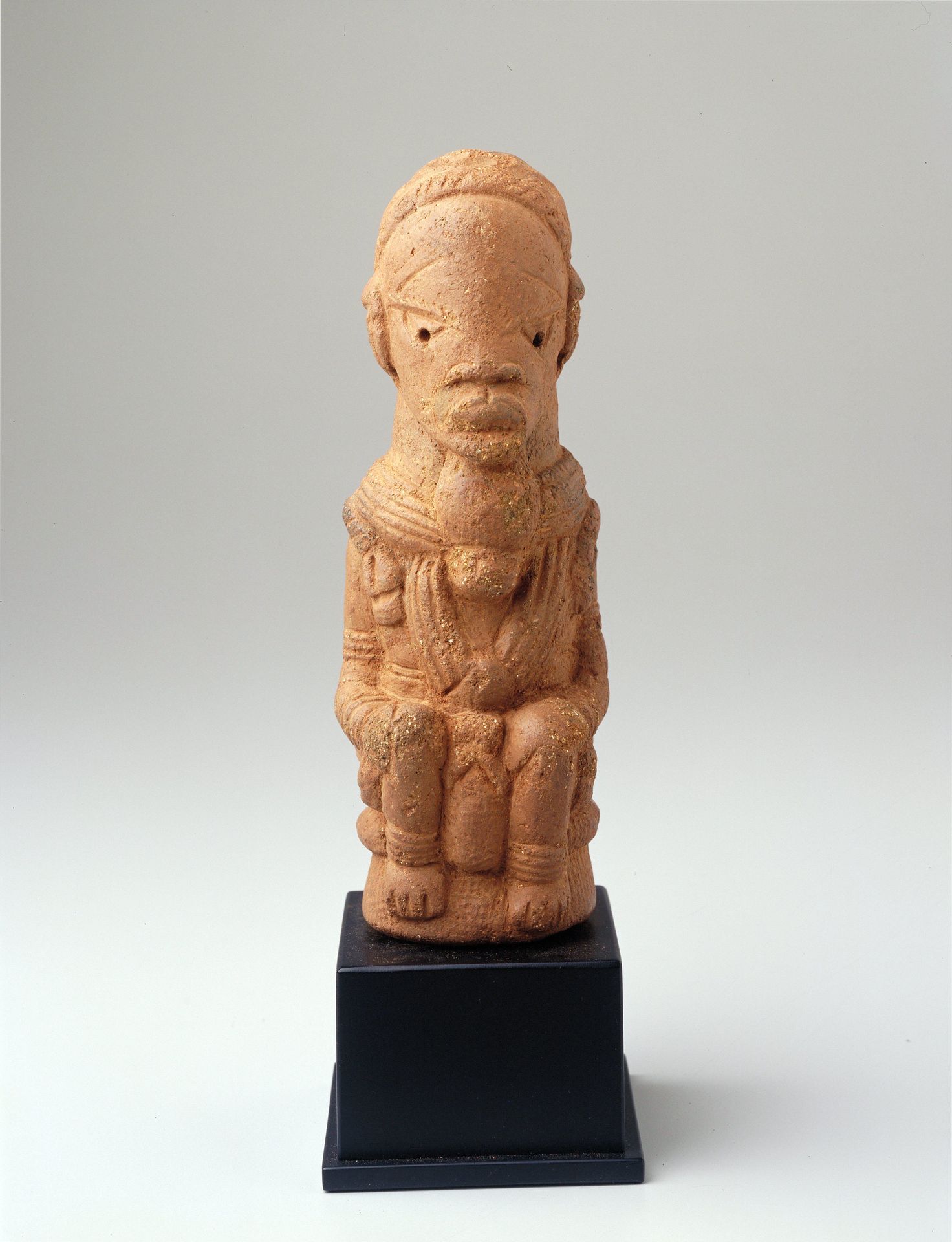 Seated Figure by Nok