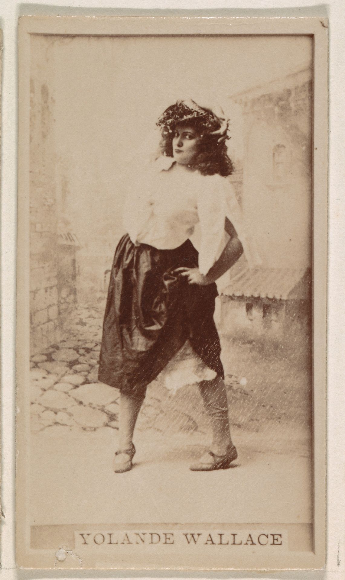 Yolande Wallace, from the Actresses series (N245) issued by Kinney Brothers to promote Sweet Caporal Cigarettes by Kinney Brothers Tobacco Company