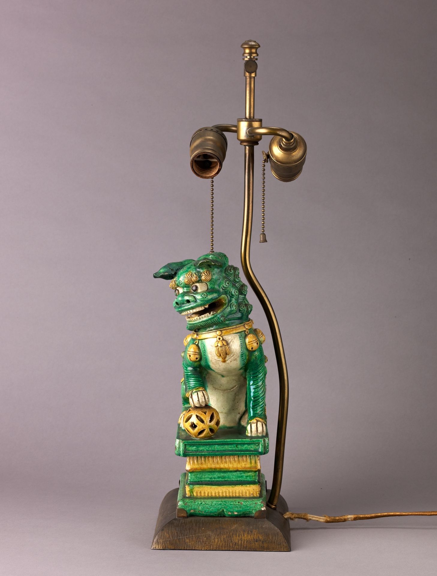 Figure of lion mounted as lamp by Chinese