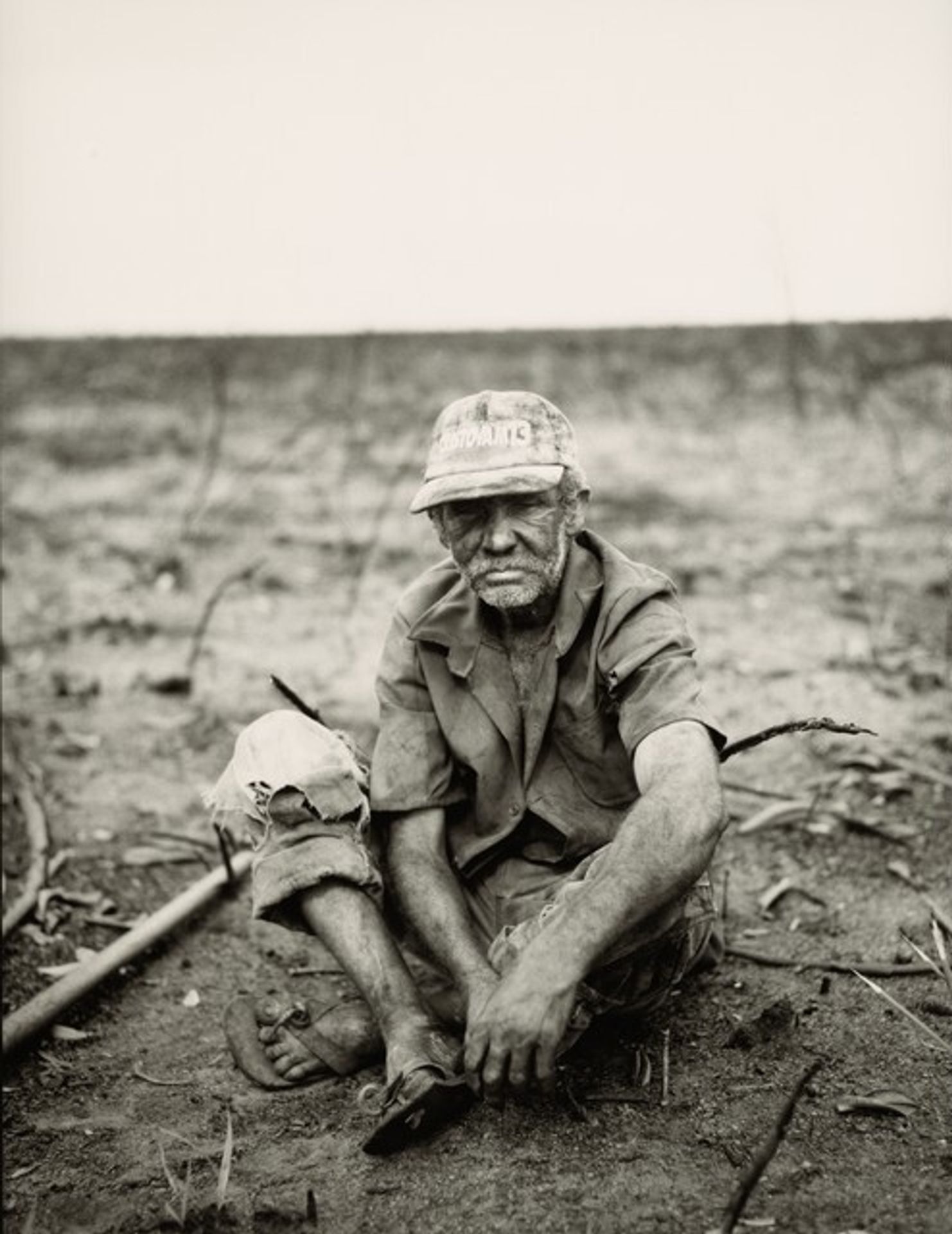 Mauro Ferreira das Neves Works as a Migrant Laborer Burning and Clearing the Land on the Farms around Grande Sertão Veredas National Park, Brazil by Fazal Sheikh
