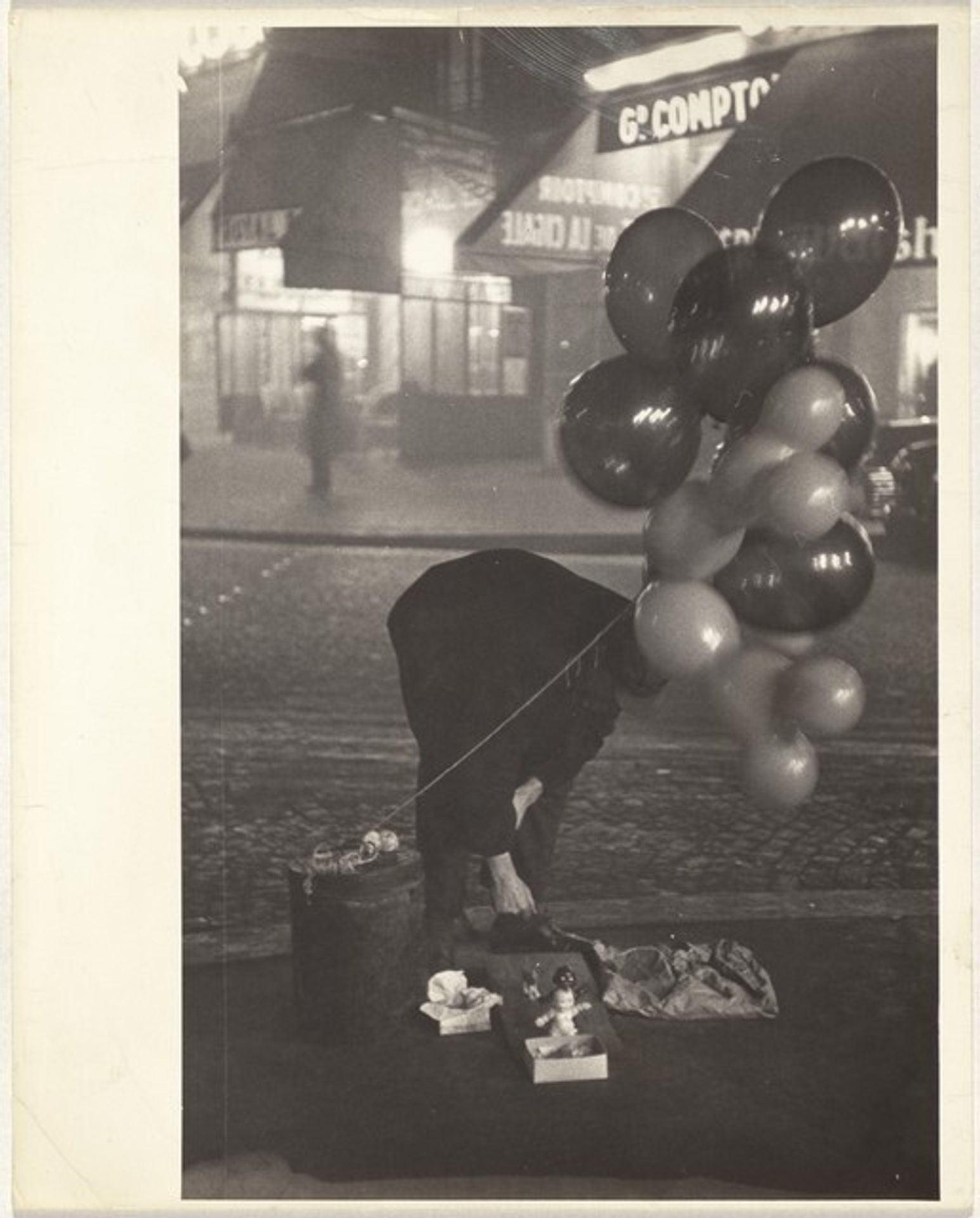 Balloon man, Paris by Robert Frank
