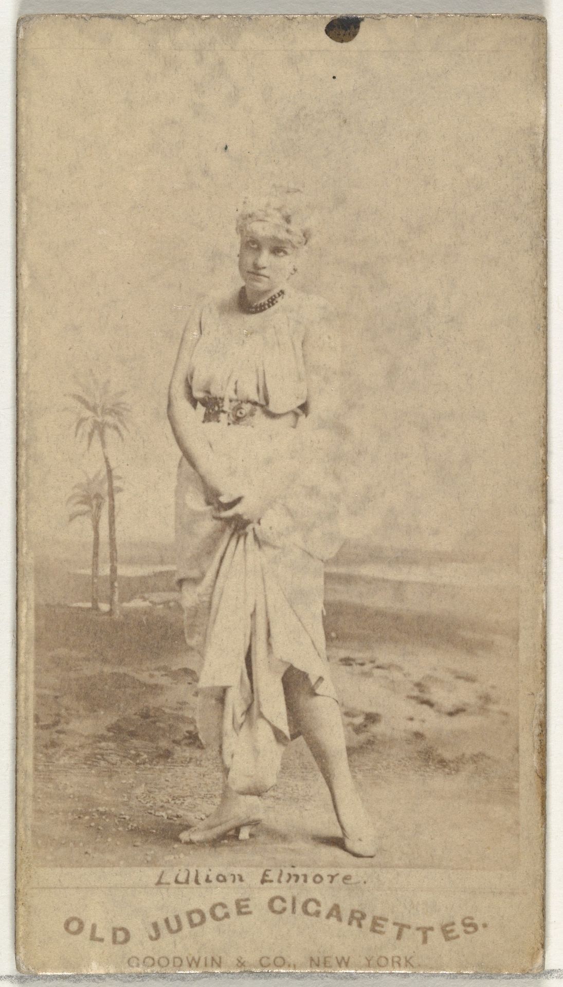 Lillian Elmore, from the Actors and Actresses series (N171) for Old Judge Cigarettes by Goodwin & Company