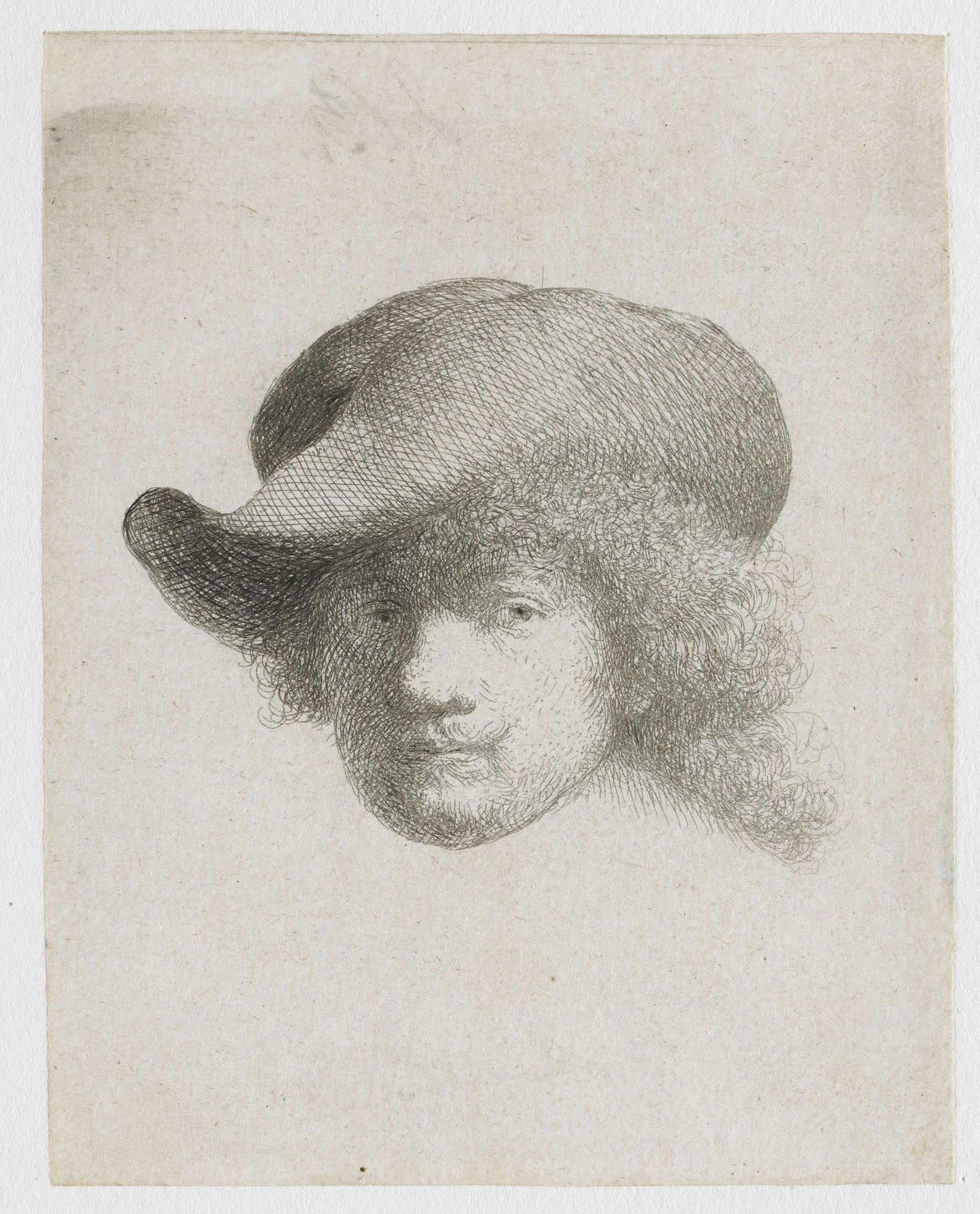 Self-portrait in a soft hat and a patterned cloak by Rembrandt van Rijn