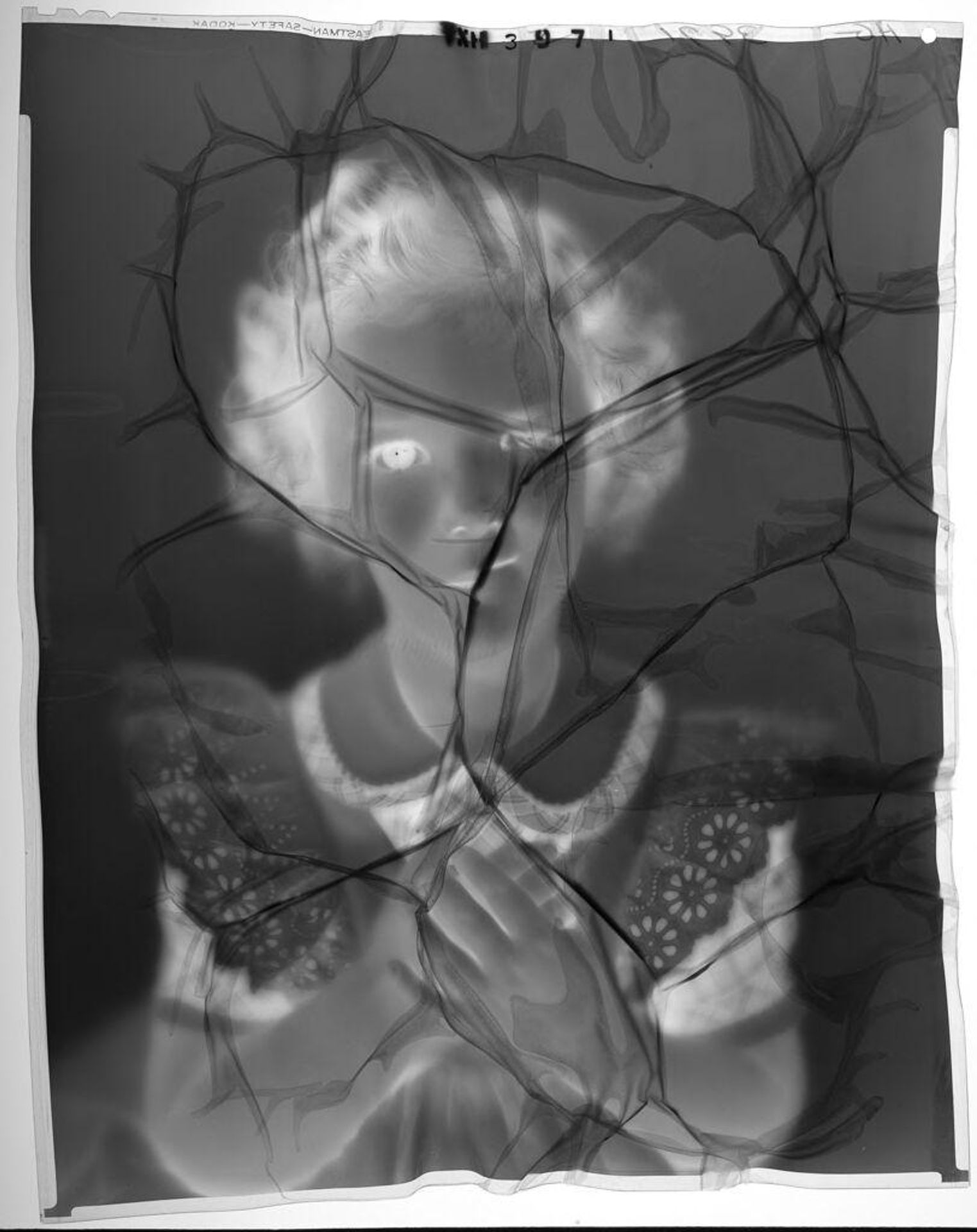 Untitled (portrait of a little girl, hands folded in front of chest) by Paul Gittings