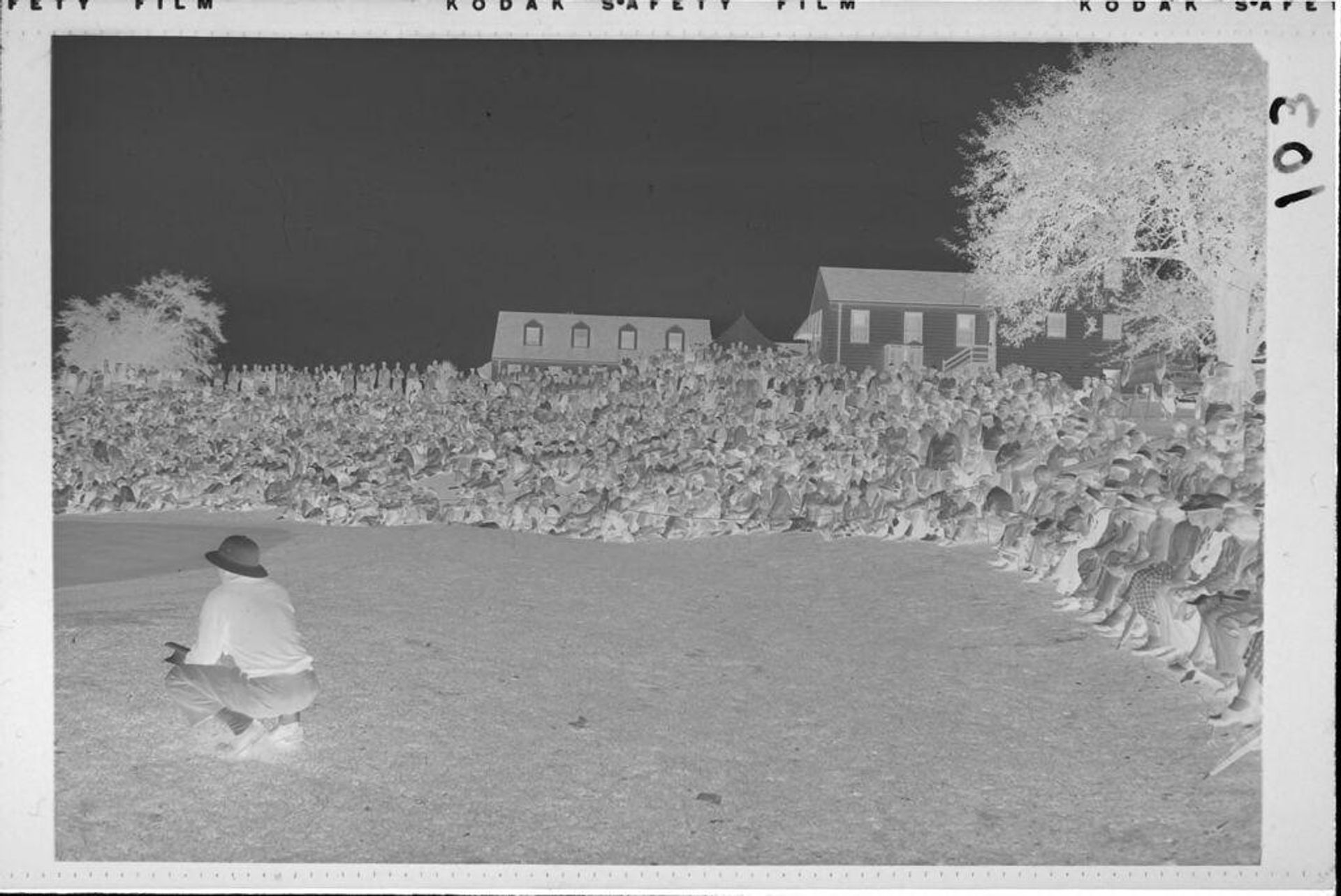 Untitled (crowd watching golf tournament) by Robert Burian